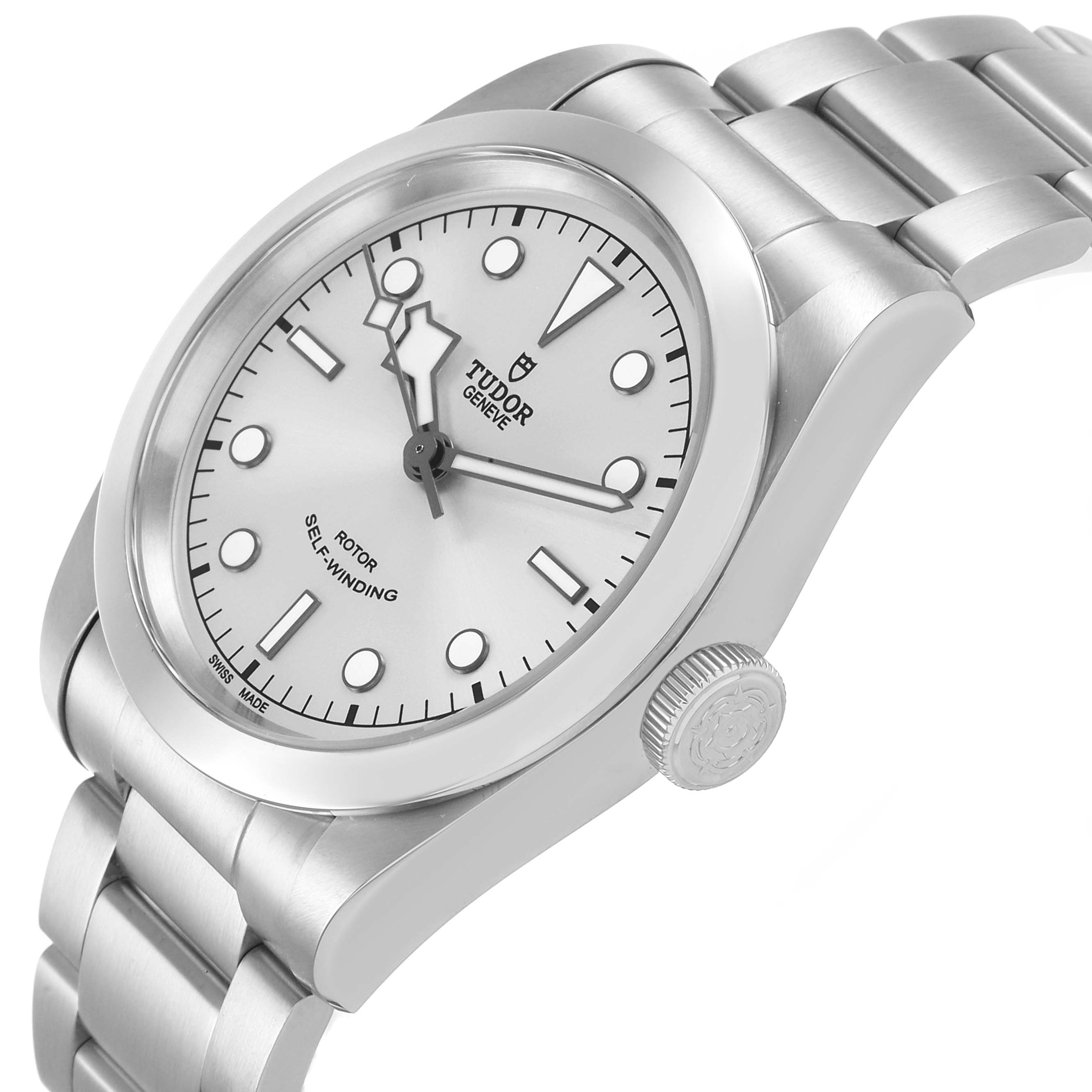 The Tudor Heritage Black Bay M79540 Men's Stainless Steel Silver Dial watch is shown at an angled side view, highlighting the face, bezel, crown, and bracelet.