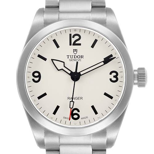 The Tudor Heritage Ranger 79930 Men's Stainless Steel Beige Dial watch is shown from a front angle, highlighting its dial, hands, and crown.