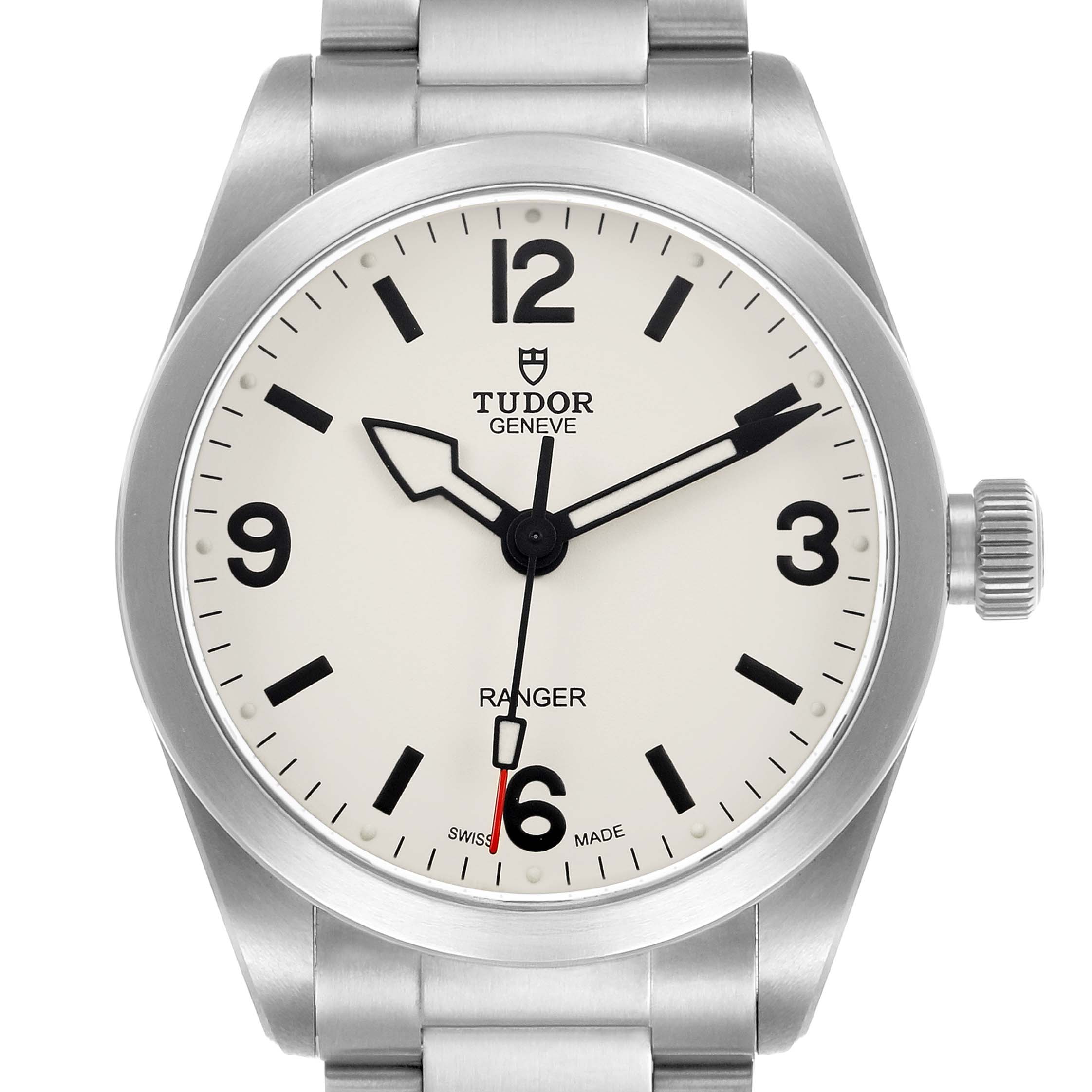 The Tudor Heritage Ranger 79930 Men's Stainless Steel Beige Dial watch is shown face-on, displaying the dial, hands, crown, and part of the bracelet.