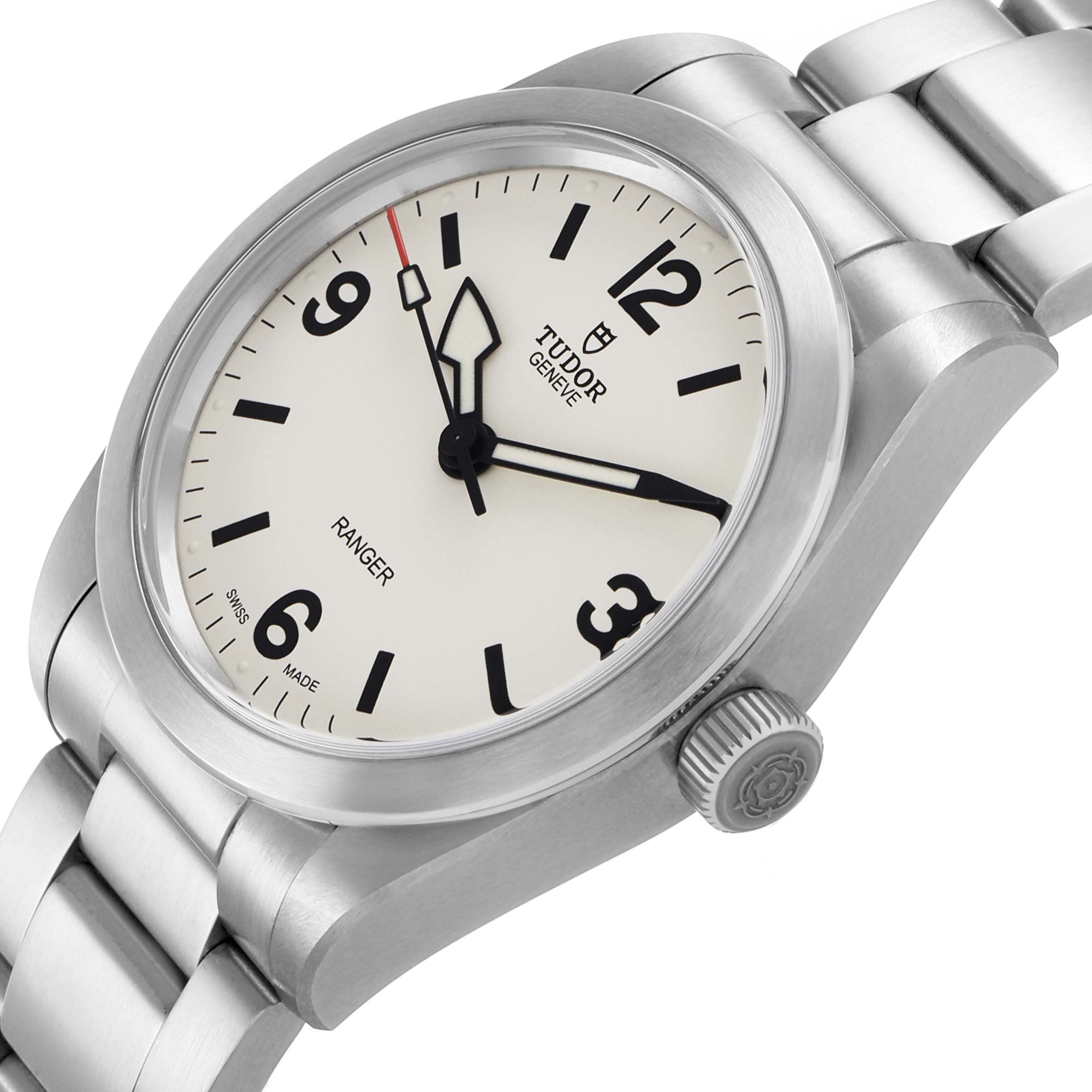 The Tudor Heritage Ranger 79930 Men's Stainless Steel Beige Dial watch is angled to show the face, bezel, case, crown, and part of the bracelet.