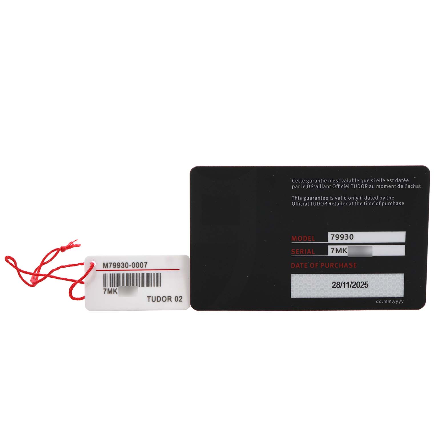 The image shows the warranty card and a tag for the Tudor Heritage Ranger 79930 Men's Stainless Steel Beige Dial model, not the watch itself.