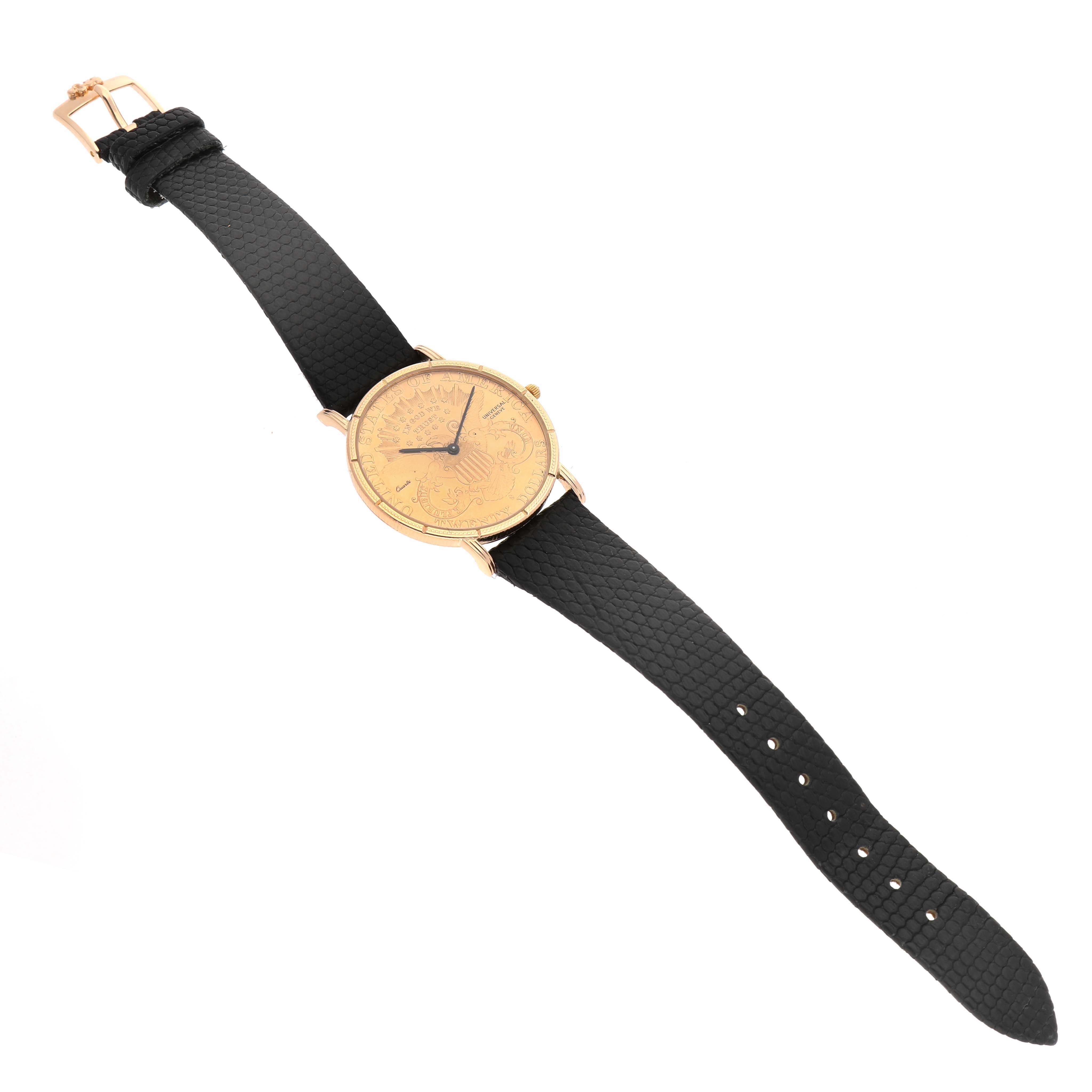 The Universal Genève 1896 Men's Yellow Gold Yellow Dial 20 Dollars Double Eagle watch is shown from a top view, highlighting its gold coin dial and black strap.