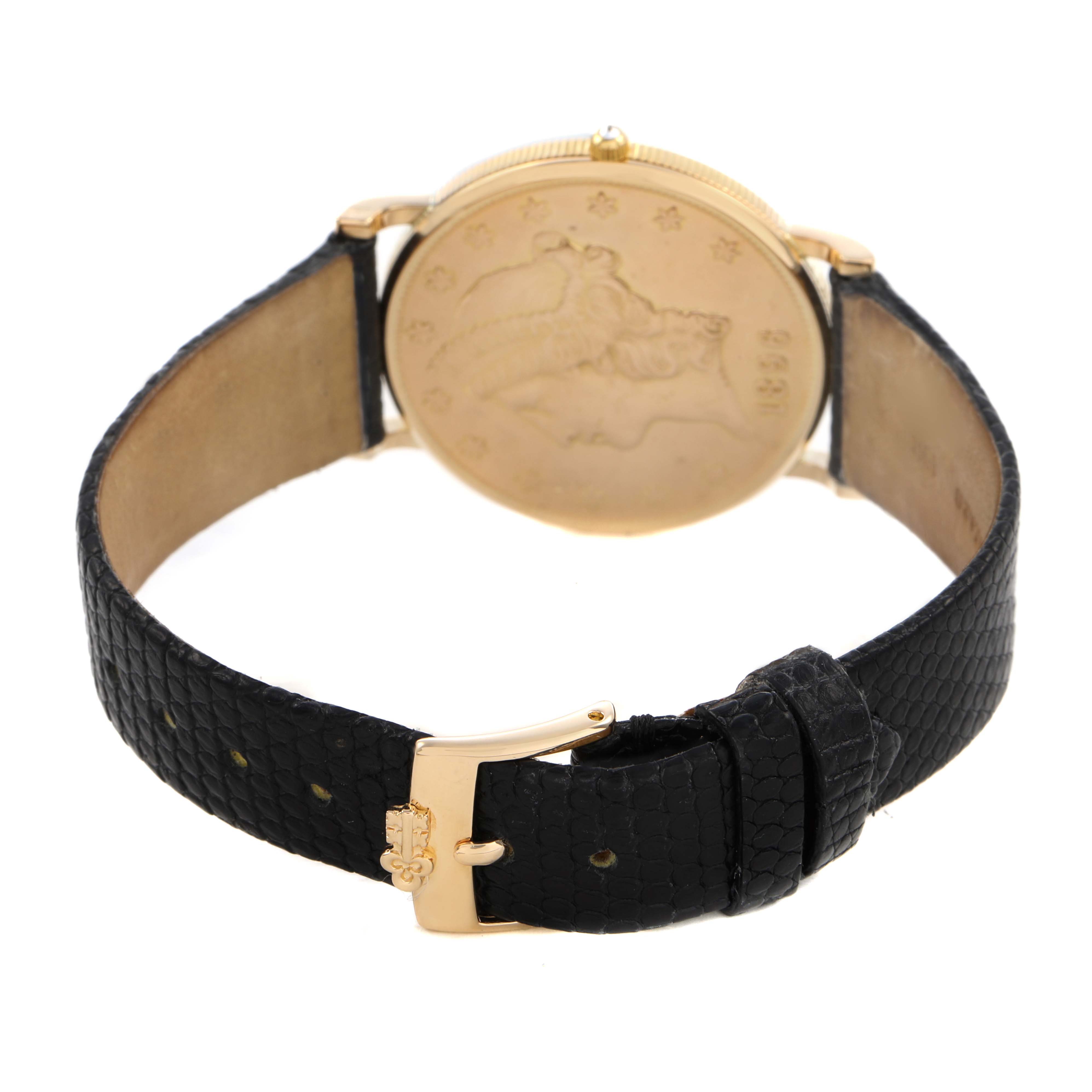 The Universal Genève 1896 Men's Yellow Gold Yellow Dial 20 Dollars Double Eagle watch is shown from the back, displaying the engraved coin case and black leather strap.