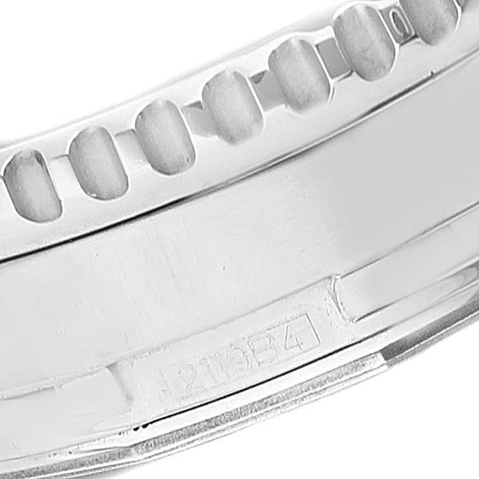 This close-up image shows part of the bezel and case details of the Breitling Navitimer A24322 Men's Stainless Steel Black Dial A24322 Men's Stainless Steel Black Dial.