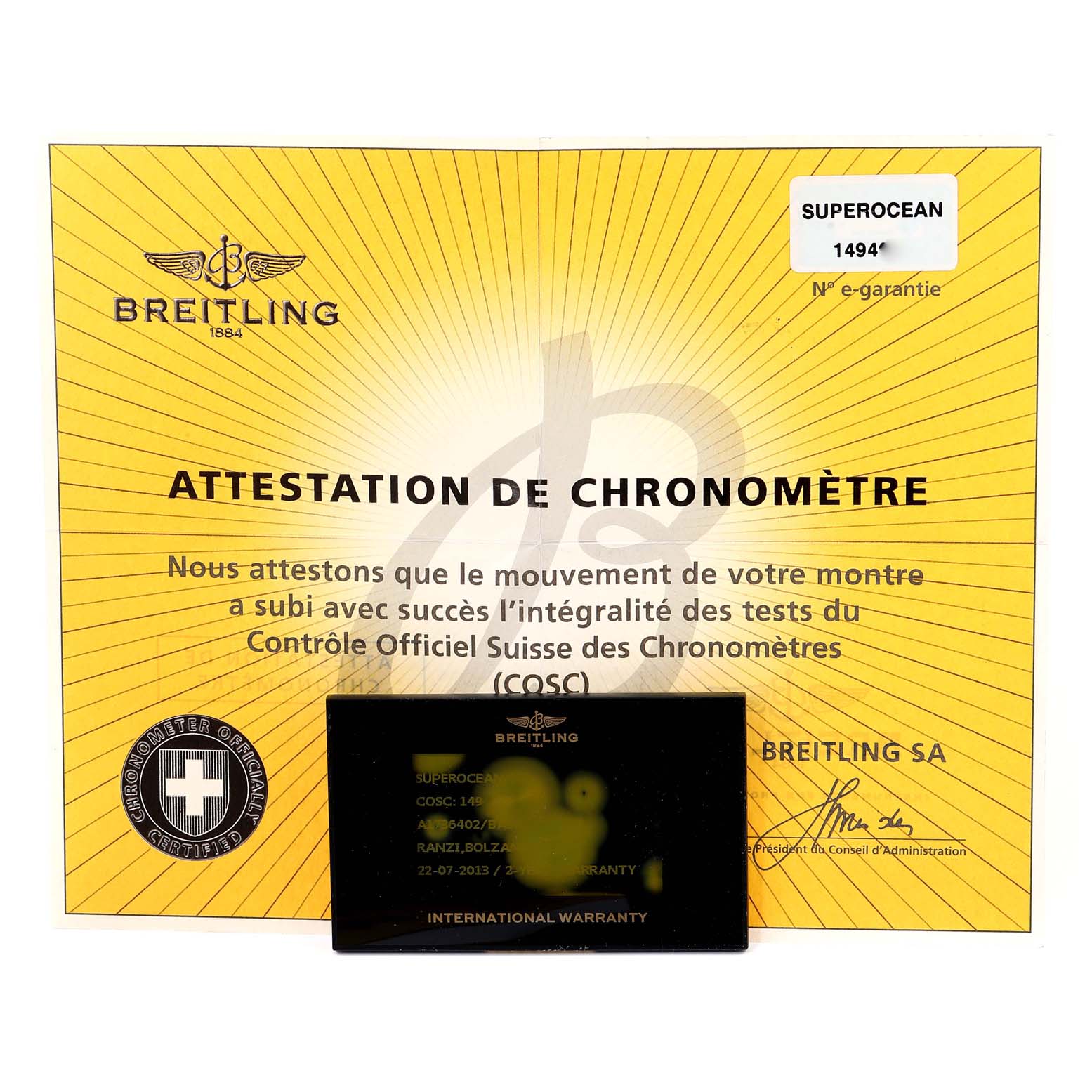 The image shows the warranty card and chronometer certification for a Breitling Superocean A17364 Men's Stainless Steel Black Dial A17364 Men's Stainless Steel Black Dial watch.