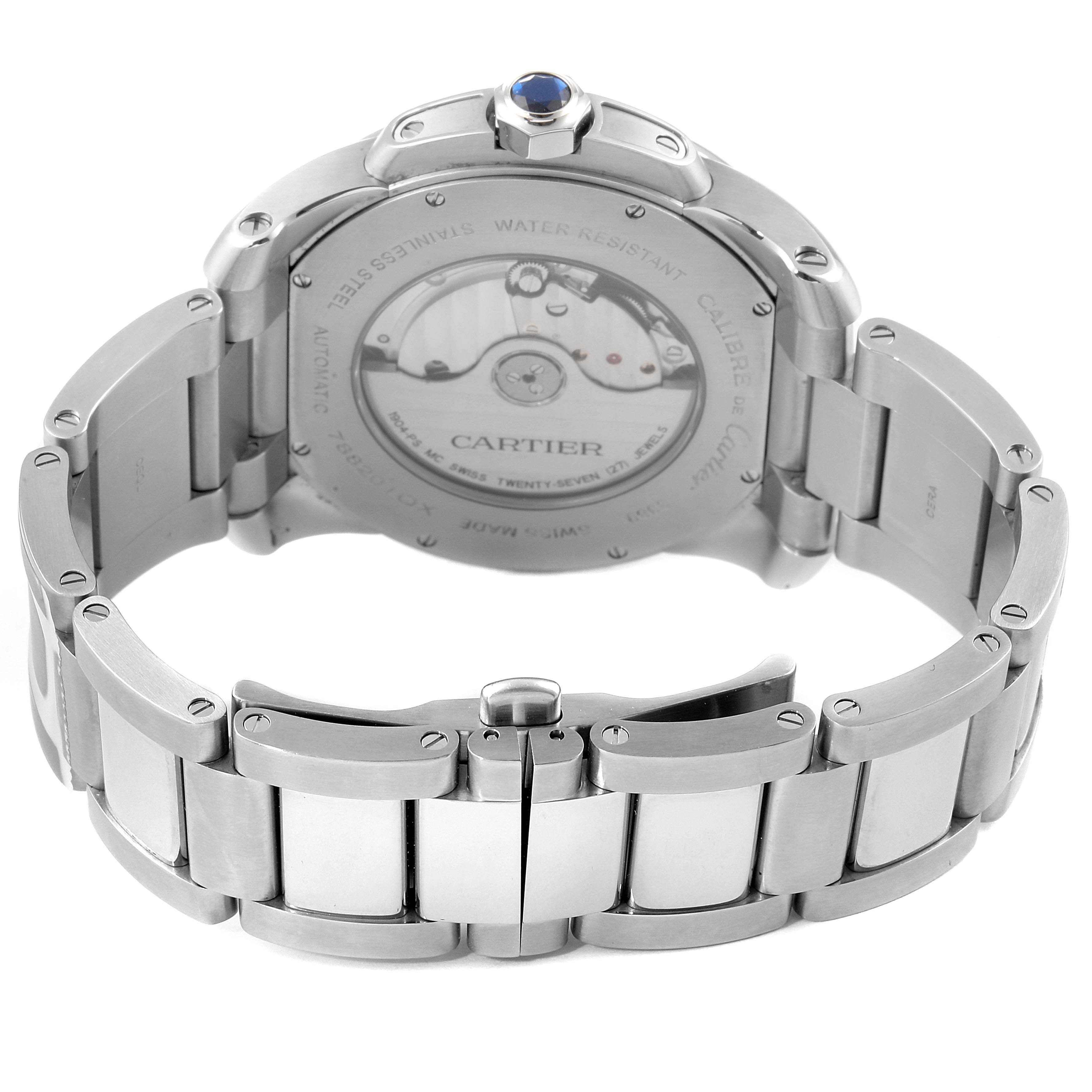 The image shows a rear view of the Calibre de Cartier watch by Cartier, highlighting its automatic movement and metal bracelet.