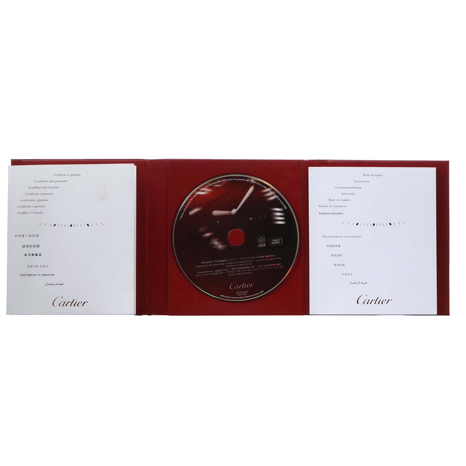 This image shows the open packaging of a Cartier Ballon Bleu WE902074 Women's Stainless Steel Silver Dial accessory set, including a DVD and documentation.