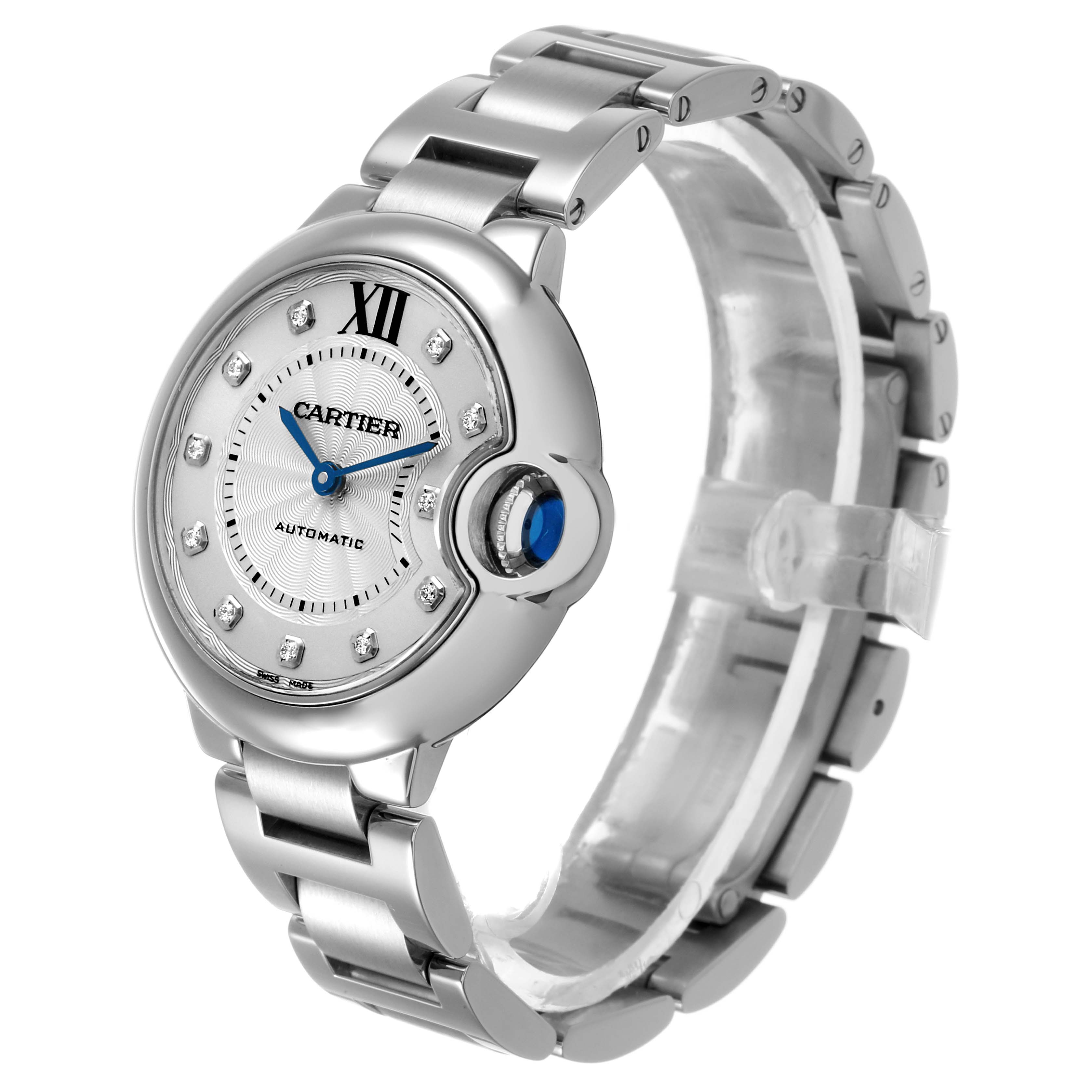 The Cartier Ballon Bleu WE902074 Women's Stainless Steel Silver Dial watch is shown from a three-quarter angle, highlighting the case, dial, bracelet, and crown.
