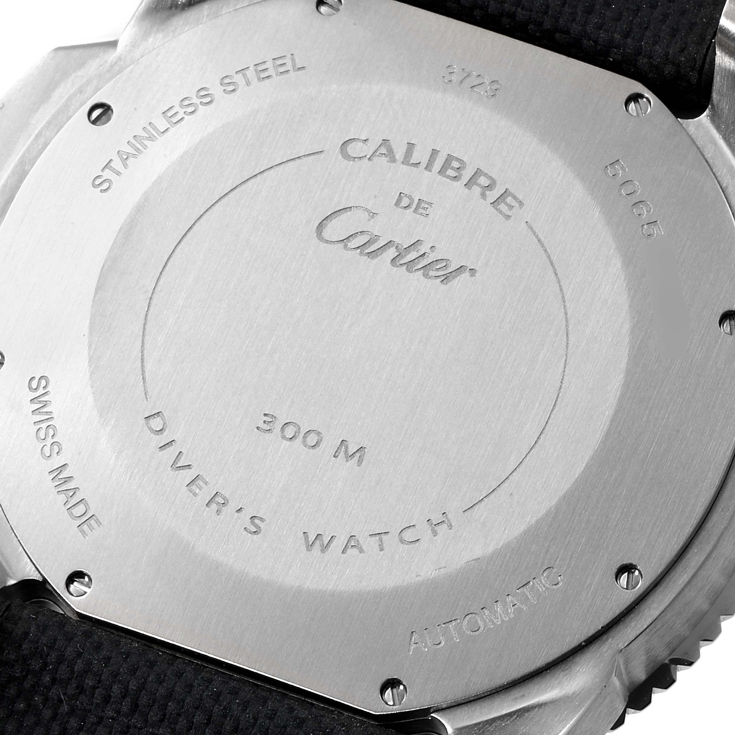 This image shows the back case of a Calibre de Cartier watch by Cartier, highlighting its specifications.
