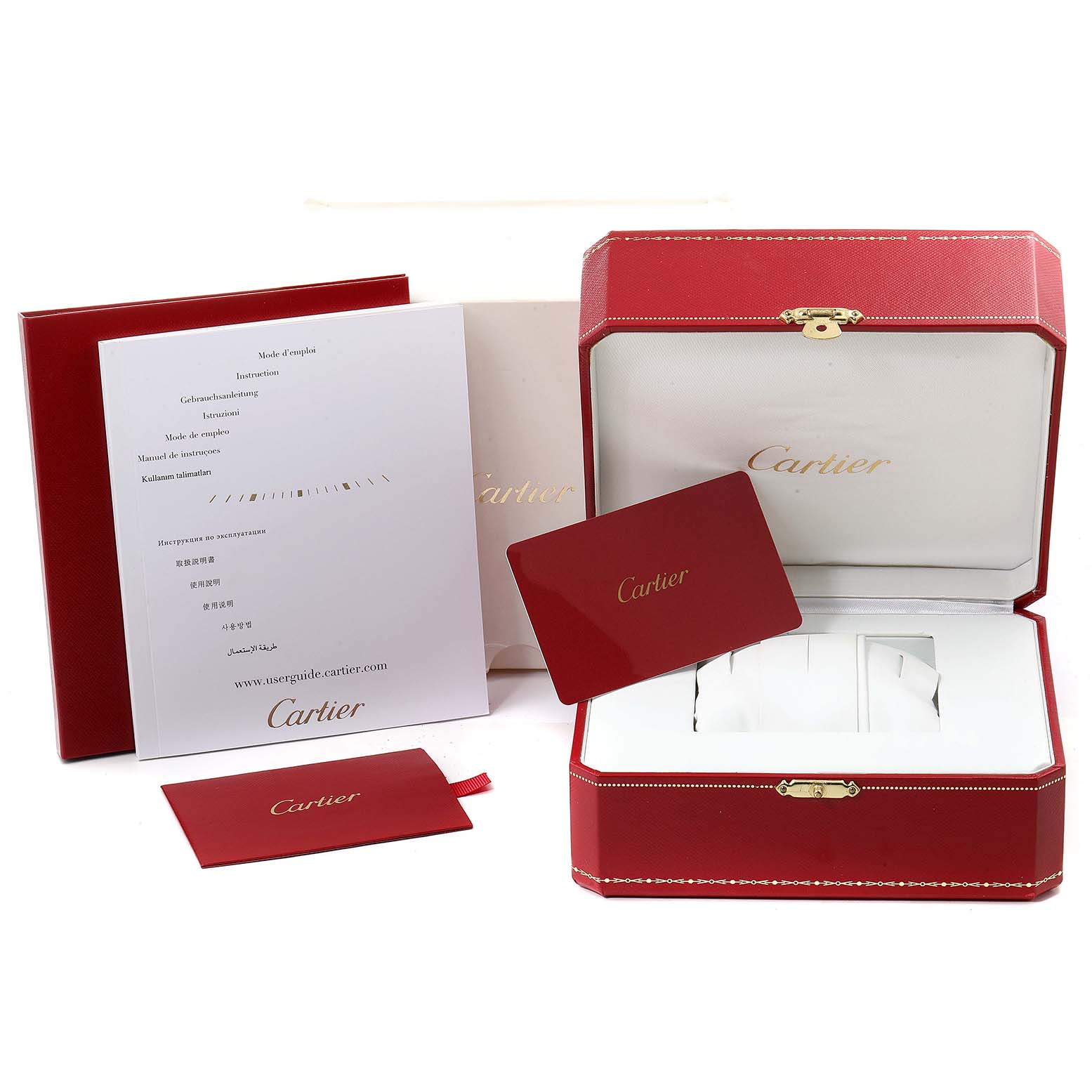The image shows the packaging and accessories of a Calibre de Cartier watch, including the red box, manual, and warranty card.