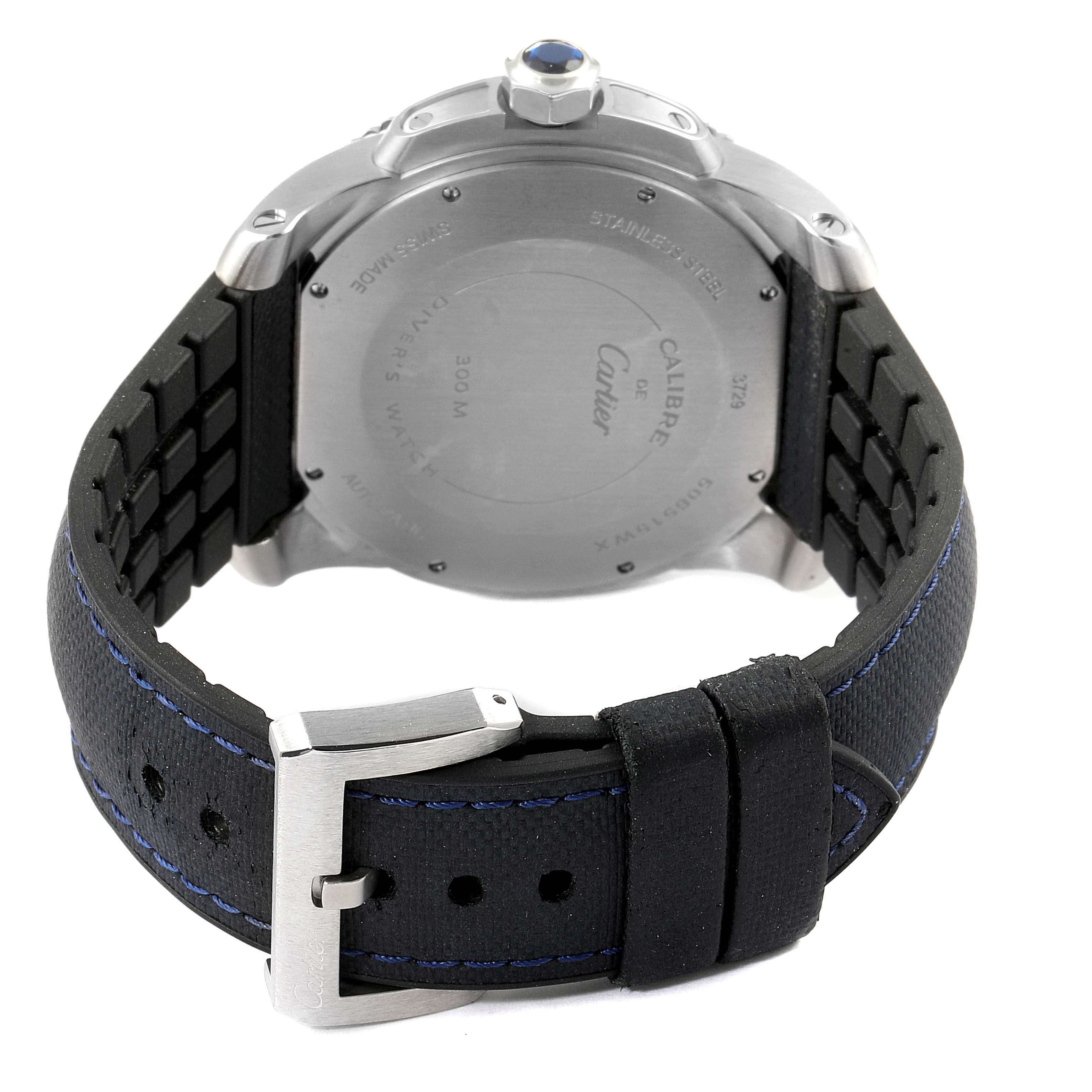 The image shows the back and strap of a Calibre de Cartier watch by Cartier, highlighting the case back and buckle.