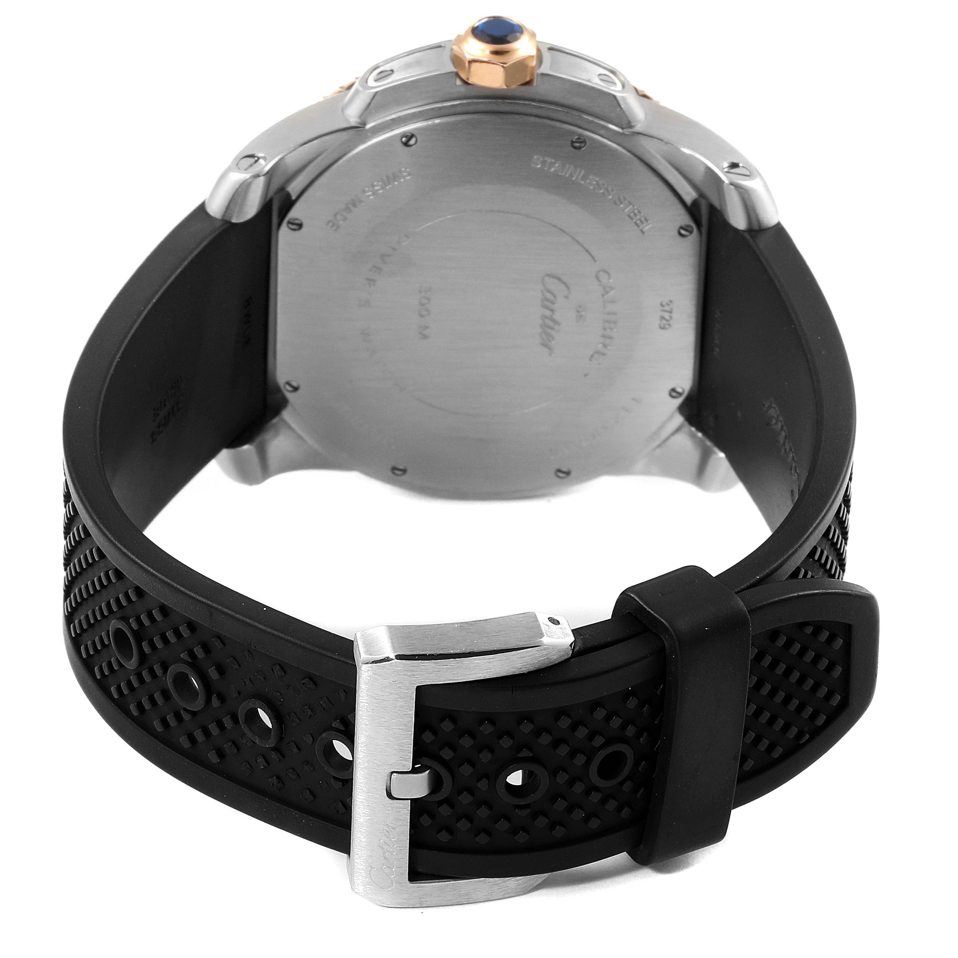 This image shows the back view of a Calibre de Cartier watch by Cartier, highlighting the case back and rubber strap with a buckle.