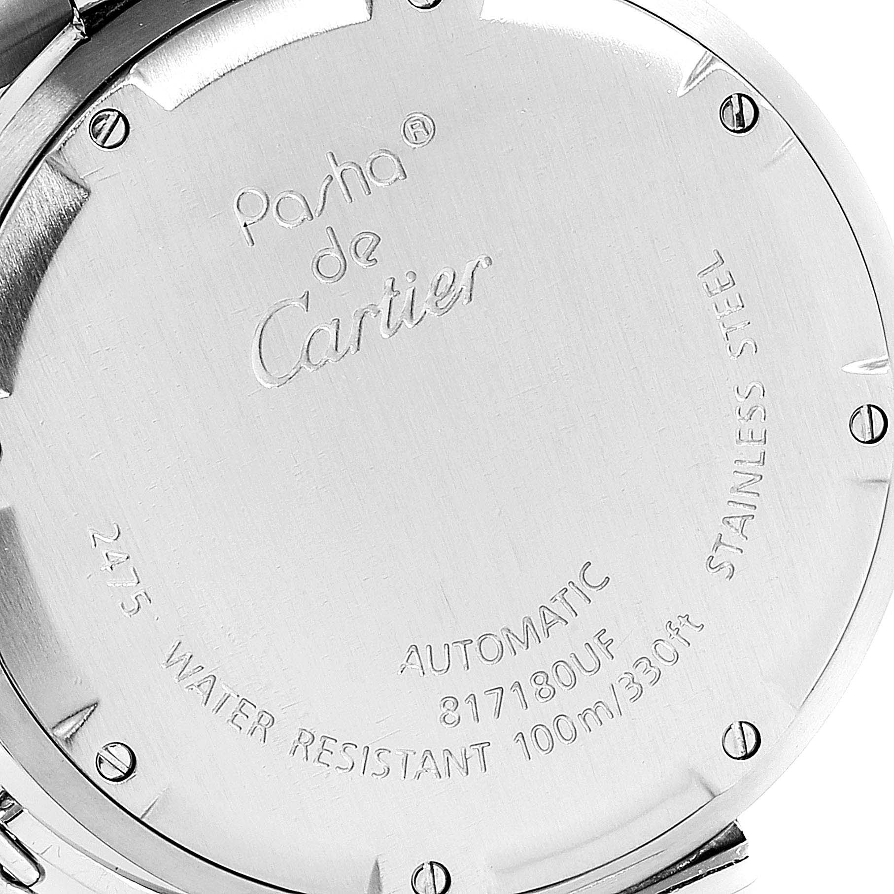 This image shows the stainless steel back case of a Pasha de Cartier watch, featuring its engravings.
