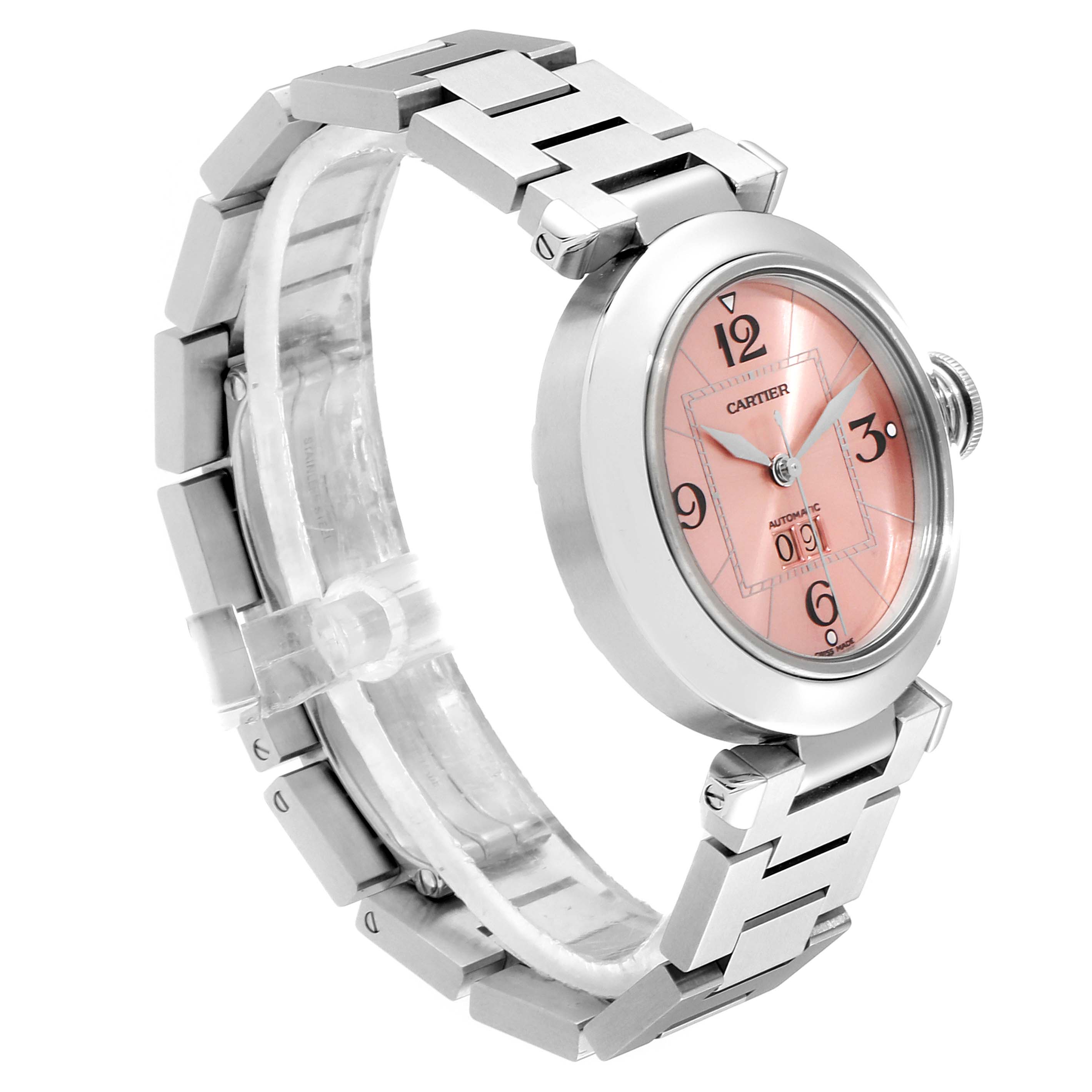 This image shows a side angle of a Cartier Pasha W31058M7 Women
s Stainless Steel Pink Dial W31058M7 Women
s Stainless Steel Pink Dial watch highlighting its pink dial, metal bracelet, and crown.