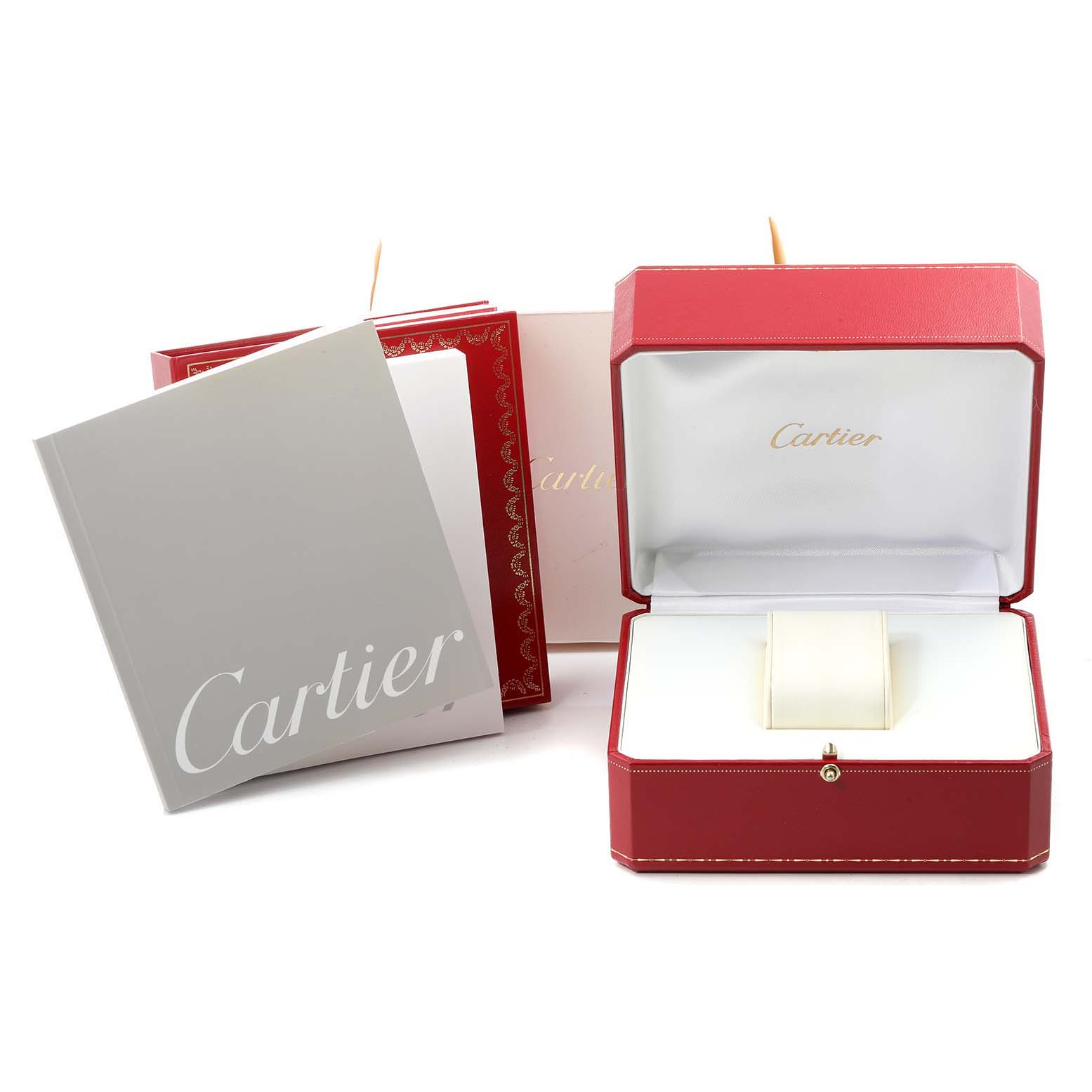 This image shows the packaging including the box and manuals for the Cartier Pasha W31055M7 Men's Stainless Steel White Dial W31055M7 Men's Stainless Steel White Dial watch.