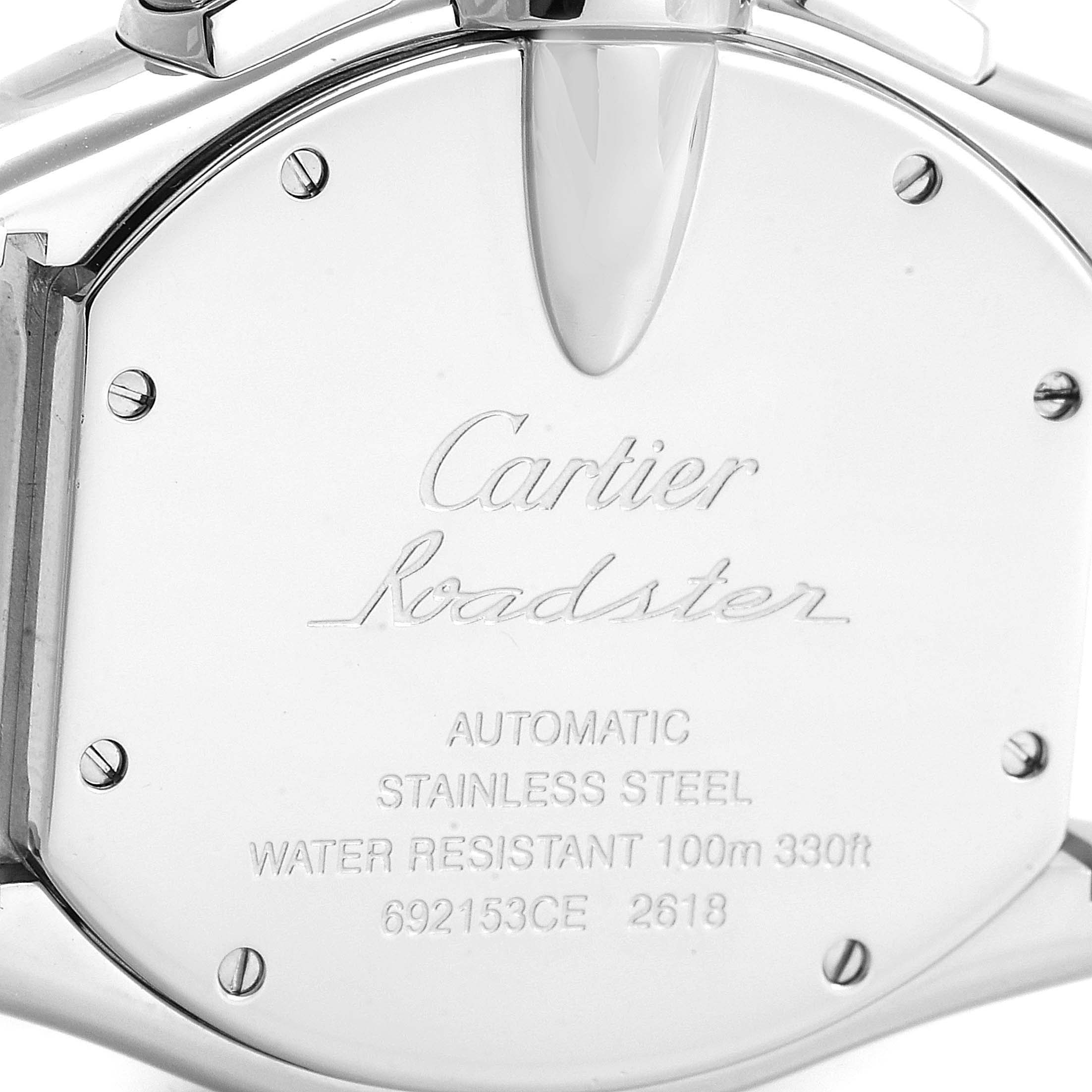 The image displays the case back of a Cartier Roadster W62019X6 Men's Stainless Steel Silver Dial W62019X6 Men's Stainless Steel Silver Dial watch, showing brand markings and specifications.