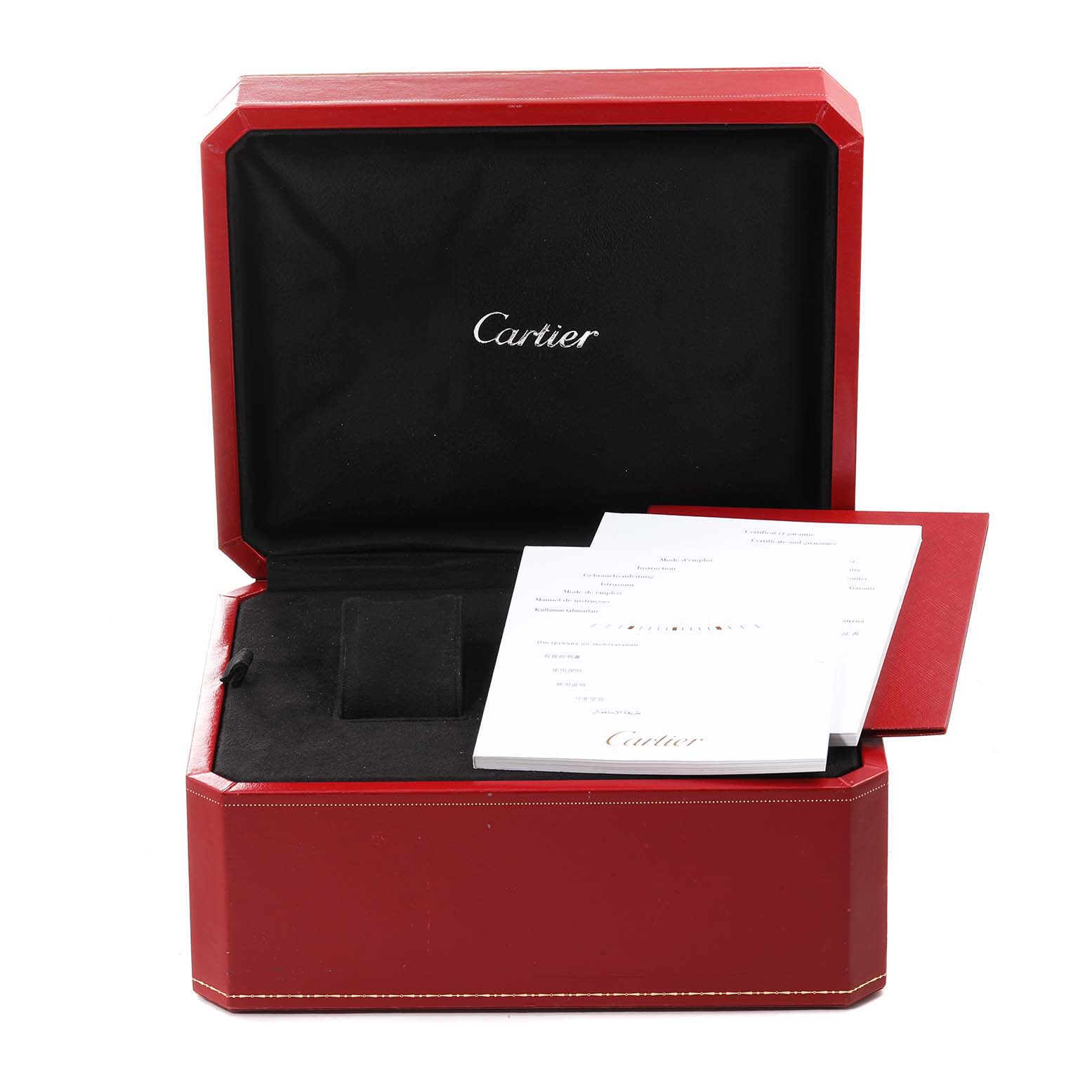 The image shows an open red Cartier box for the Roadster model watch, featuring the brand
s booklet and cushion inside.