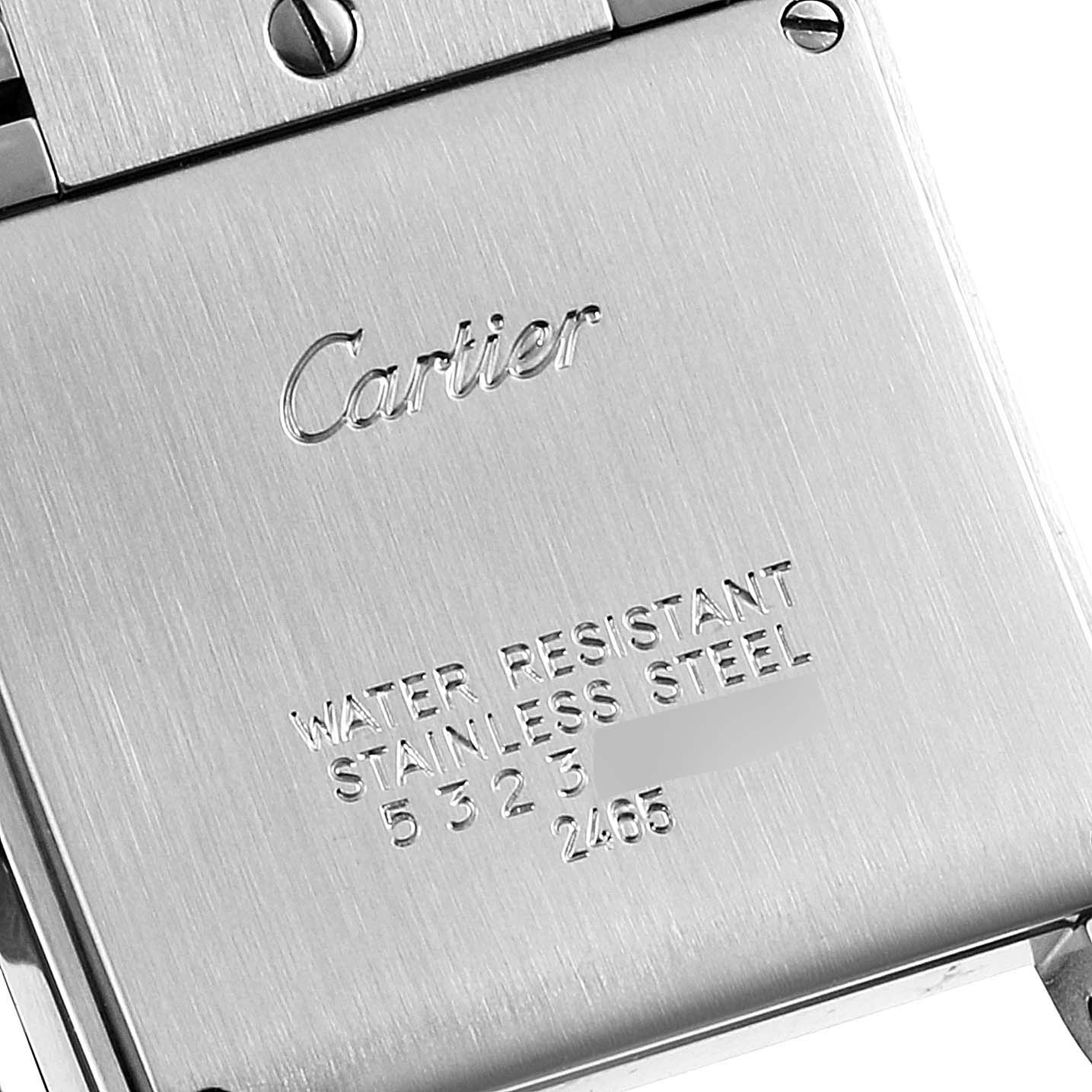 This image shows the back case of a Cartier Tank Française watch in a close-up angle.