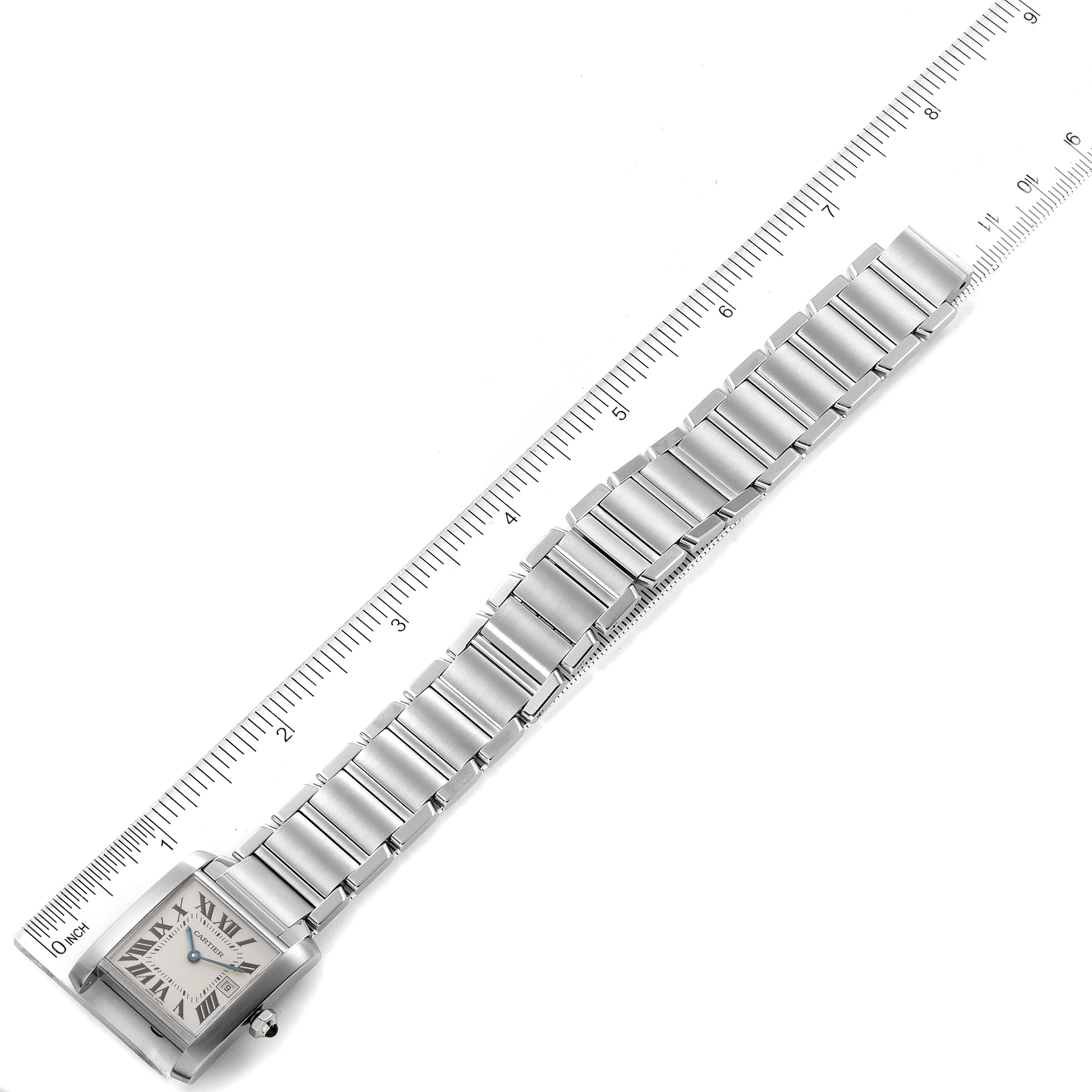 The image shows a Cartier Tank Francaise W51011Q3 Women's Stainless Steel Silver Dial W51011Q3 Women's Stainless Steel Silver Dial watch from a top-down angle, highlighting its face and linked bracelet.