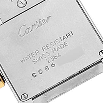 The image shows the back case of a Cartier Tank Francaise W51007Q4 Women's Steel and Gold (two tone) Silver Dial W51007Q4 Women's Steel and Gold (two tone) Silver Dial watch, highlighting its water resistance and "Swiss Made" markings.