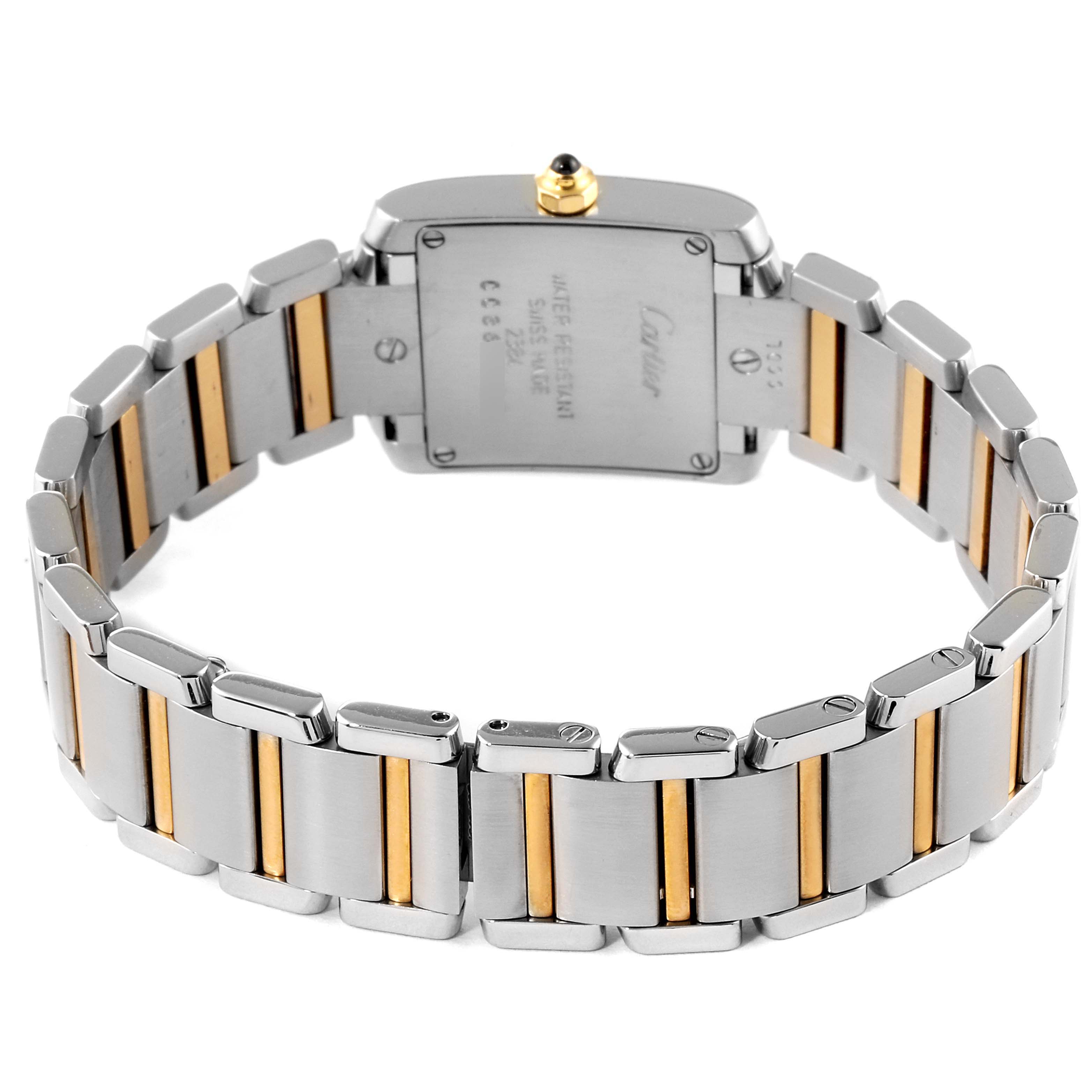 The image shows the back view of a Cartier Tank Francaise W51007Q4 Women's Steel and Gold (two tone) Silver Dial W51007Q4 Women's Steel and Gold (two tone) Silver Dial watch, highlighting its two-tone metal bracelet and case back.