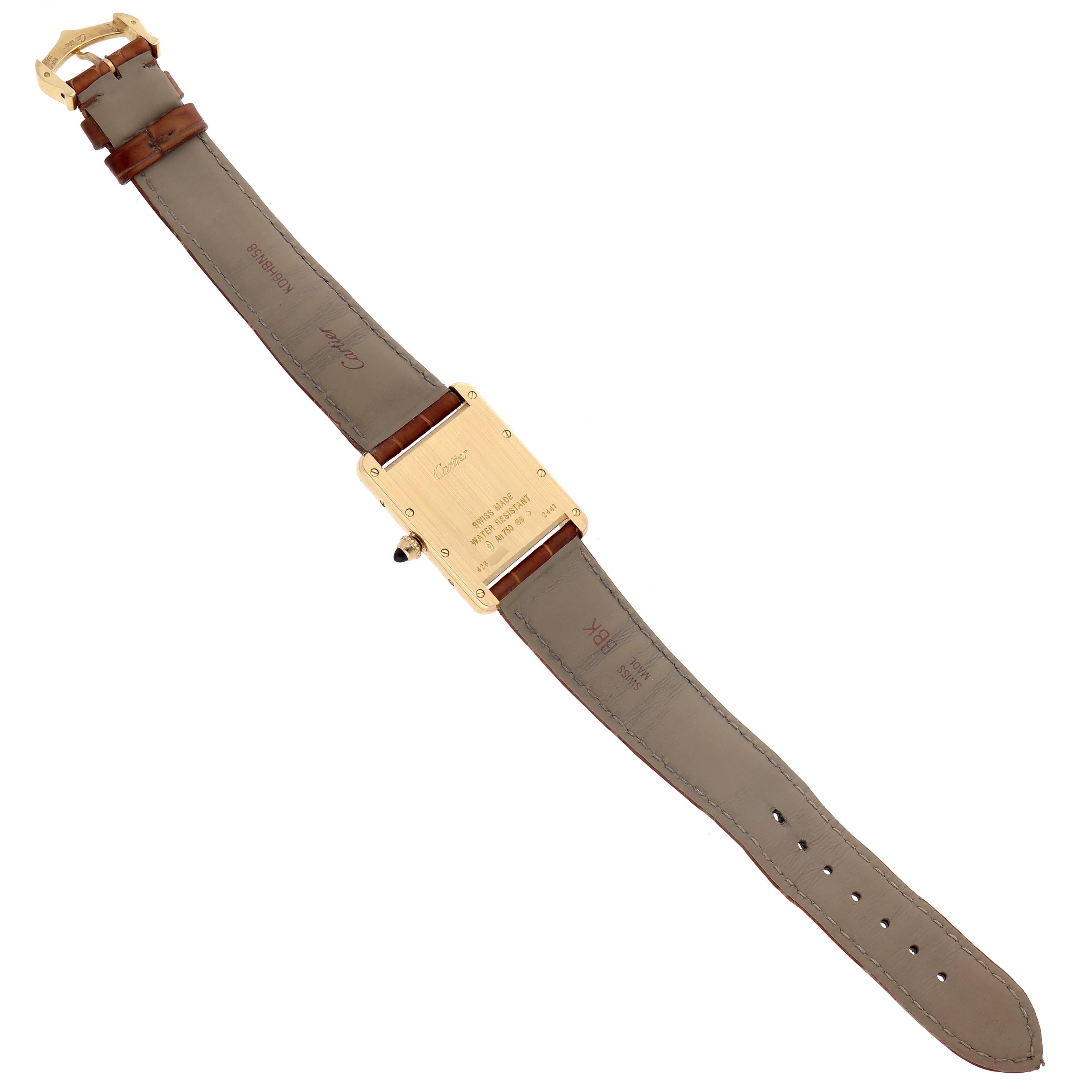 The image shows the back of a Cartier Tank Louis W1529756 Men
s White Gold Silver Dial W1529756 Men
s White Gold Silver Dial watch, displaying its leather strap and clasp.