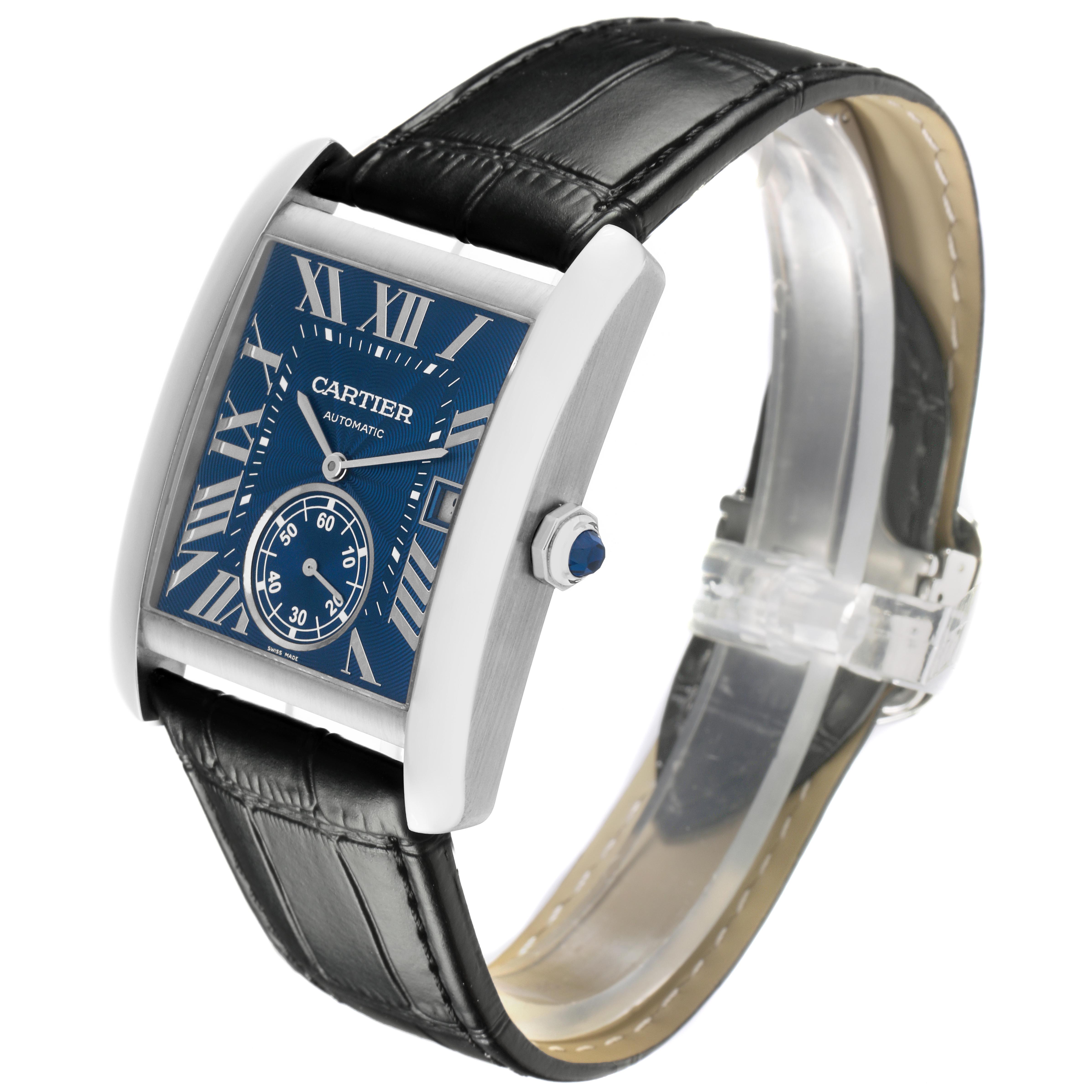 The Cartier Tank MC WSTA0010 Men
s Stainless Steel Blue Dial WSTA0010 Men
s Stainless Steel Blue Dial watch is shown at a three-quarter angle, highlighting its blue dial, Roman numerals, and black leather strap.