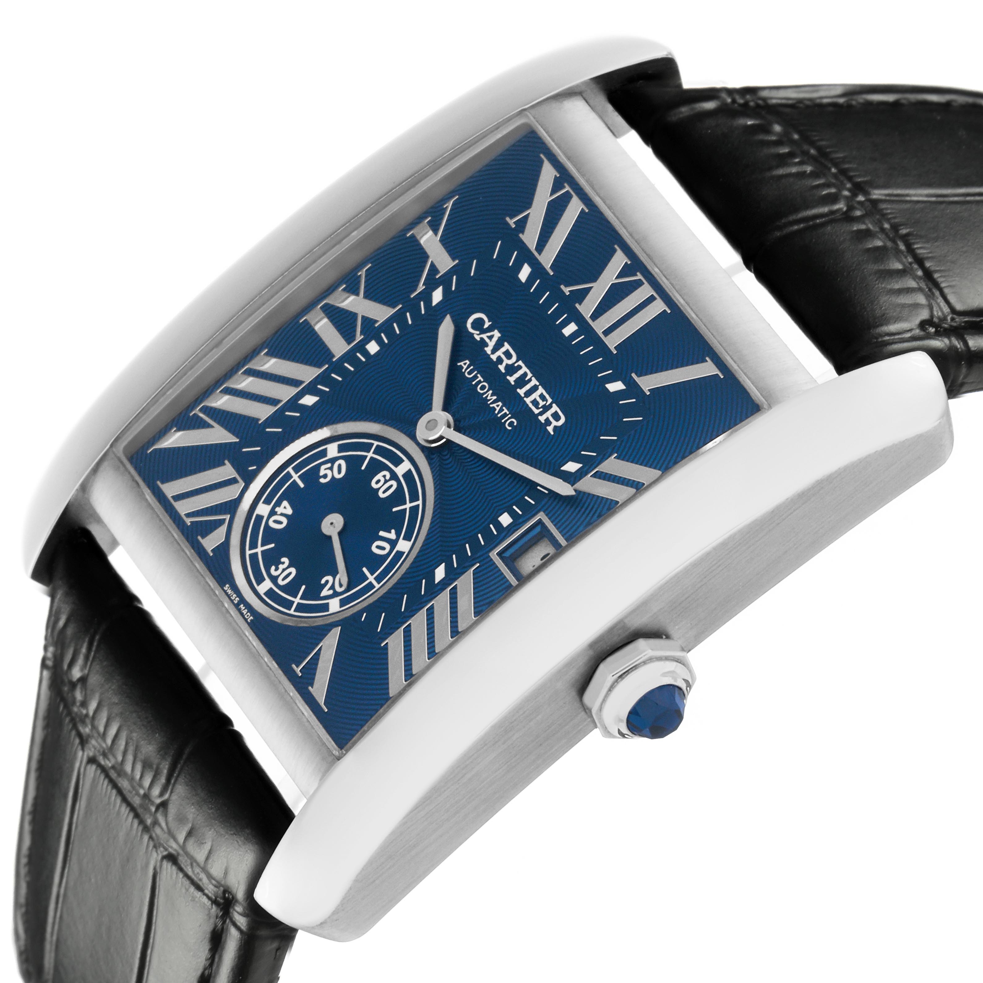 The Cartier Tank MC WSTA0010 Men
s Stainless Steel Blue Dial WSTA0010 Men
s Stainless Steel Blue Dial watch is shown at an angled side view, highlighting the blue dial, Roman numerals, leather strap, and crown.