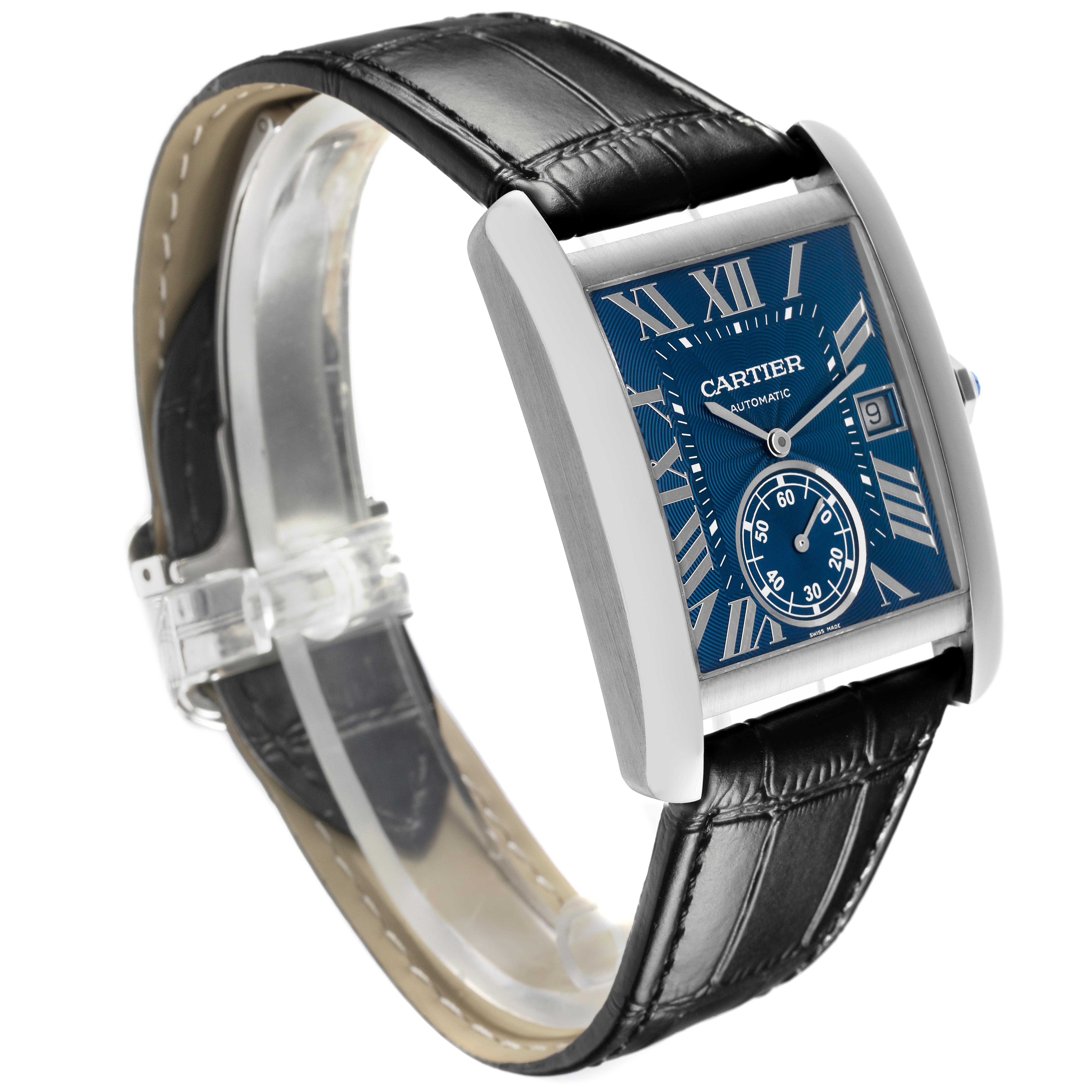 The Cartier Tank MC WSTA0010 Men
s Stainless Steel Blue Dial WSTA0010 Men
s Stainless Steel Blue Dial watch is shown at a diagonal angle, highlighting its rectangular face, leather strap, and crown.
