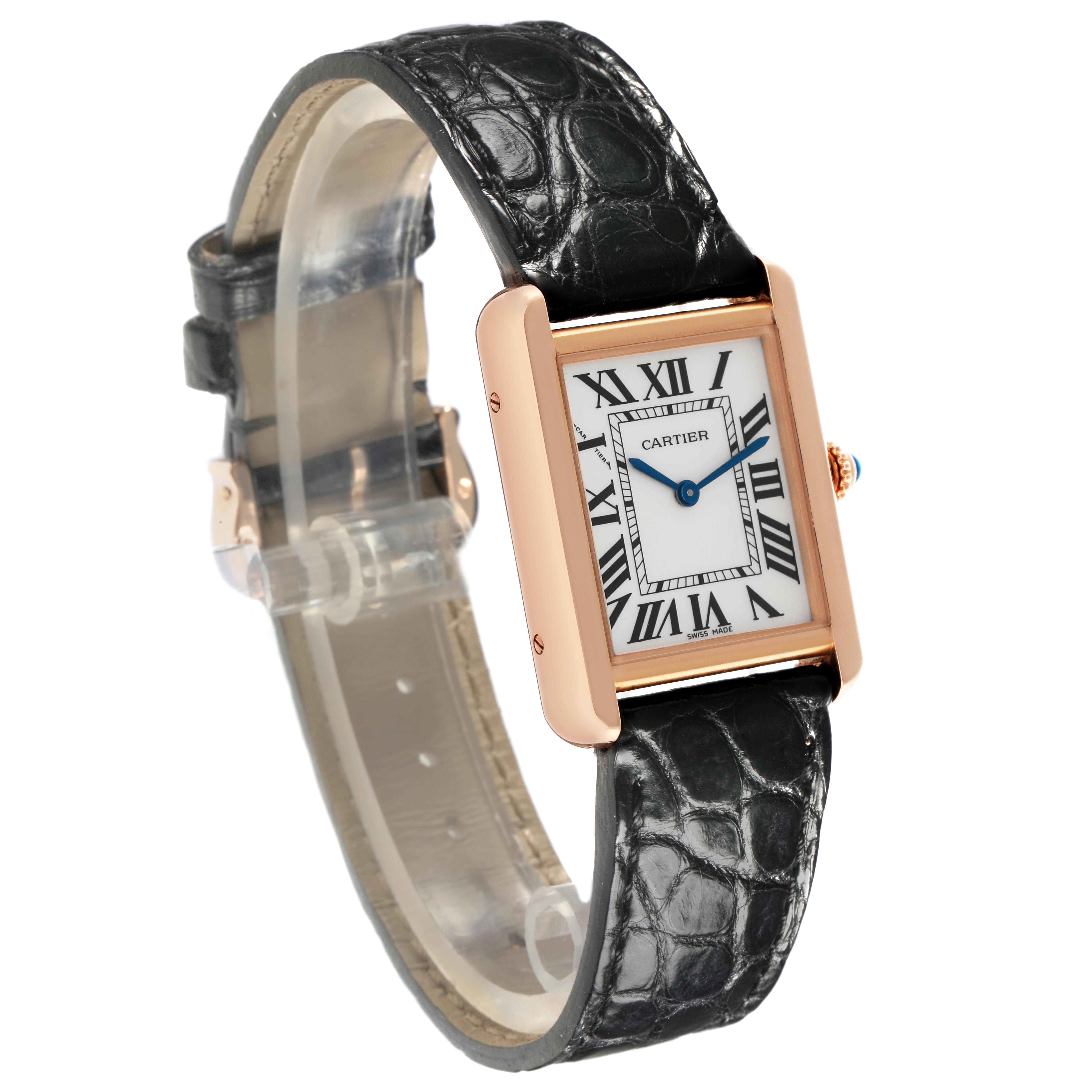 The Cartier Tank Solo W5200024 Women
s Steel and Gold (two tone) Silver Dial W5200024 Women
s Steel and Gold (two tone) Silver Dial watch is shown at a slight angle, highlighting its rectangular face, Roman numerals, and leather strap.