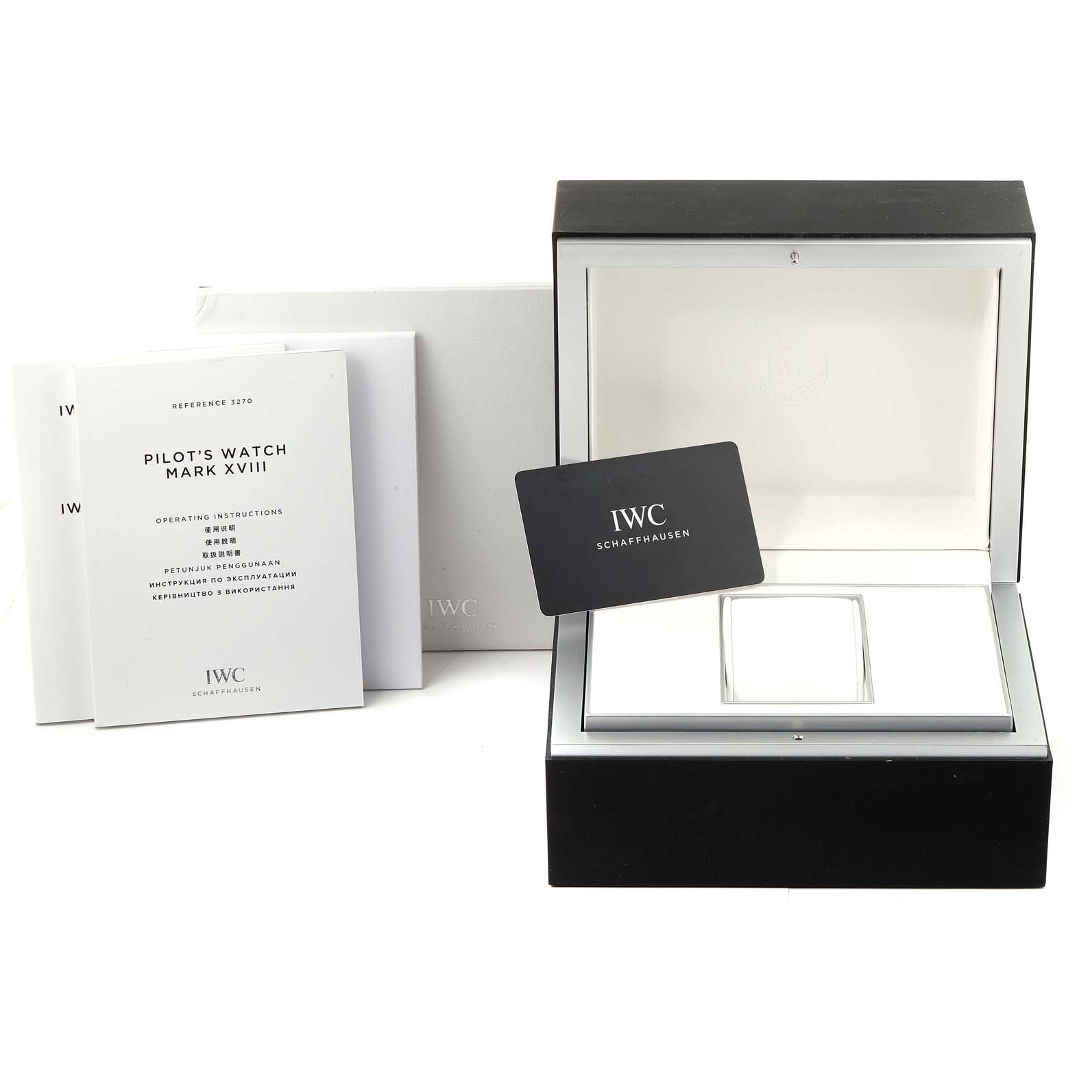 The image shows the packaging, instruction manual, warranty card, and gift box for the IWC Pilot IW327006 Men's Titanium Black Dial IW327006 Men's Titanium Black Dial's Watch Mark XVIII.