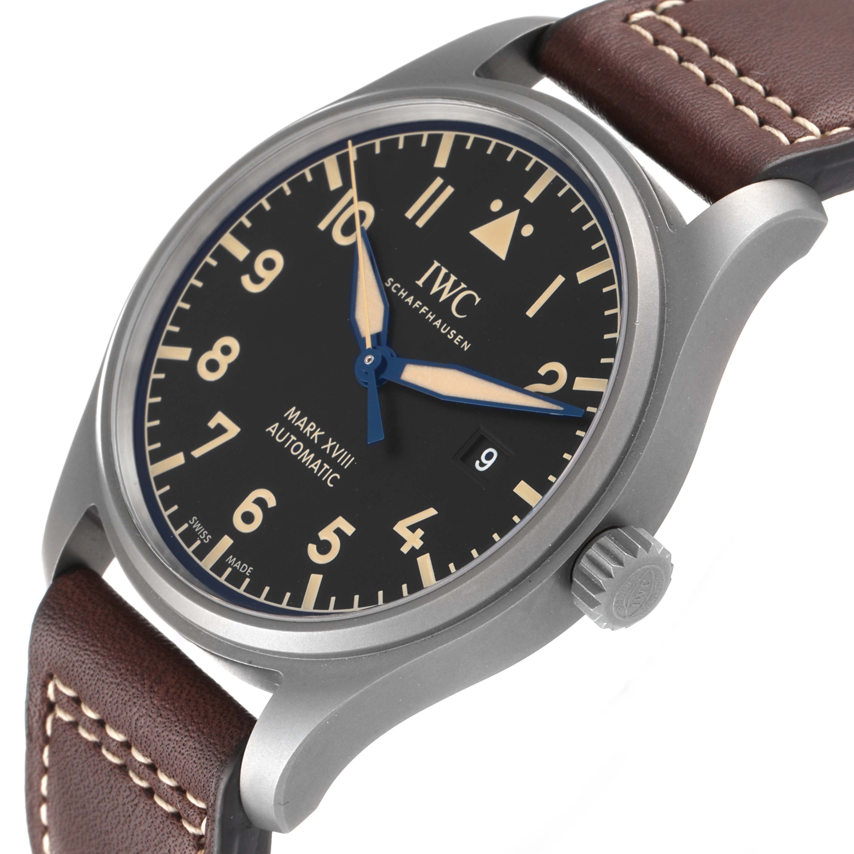 This image shows a side-angle view of the IWC Pilot IW327006 Men's Titanium Black Dial IW327006 Men's Titanium Black Dial Mark XVIII watch, highlighting the dial, hour markers, hands, and crown.