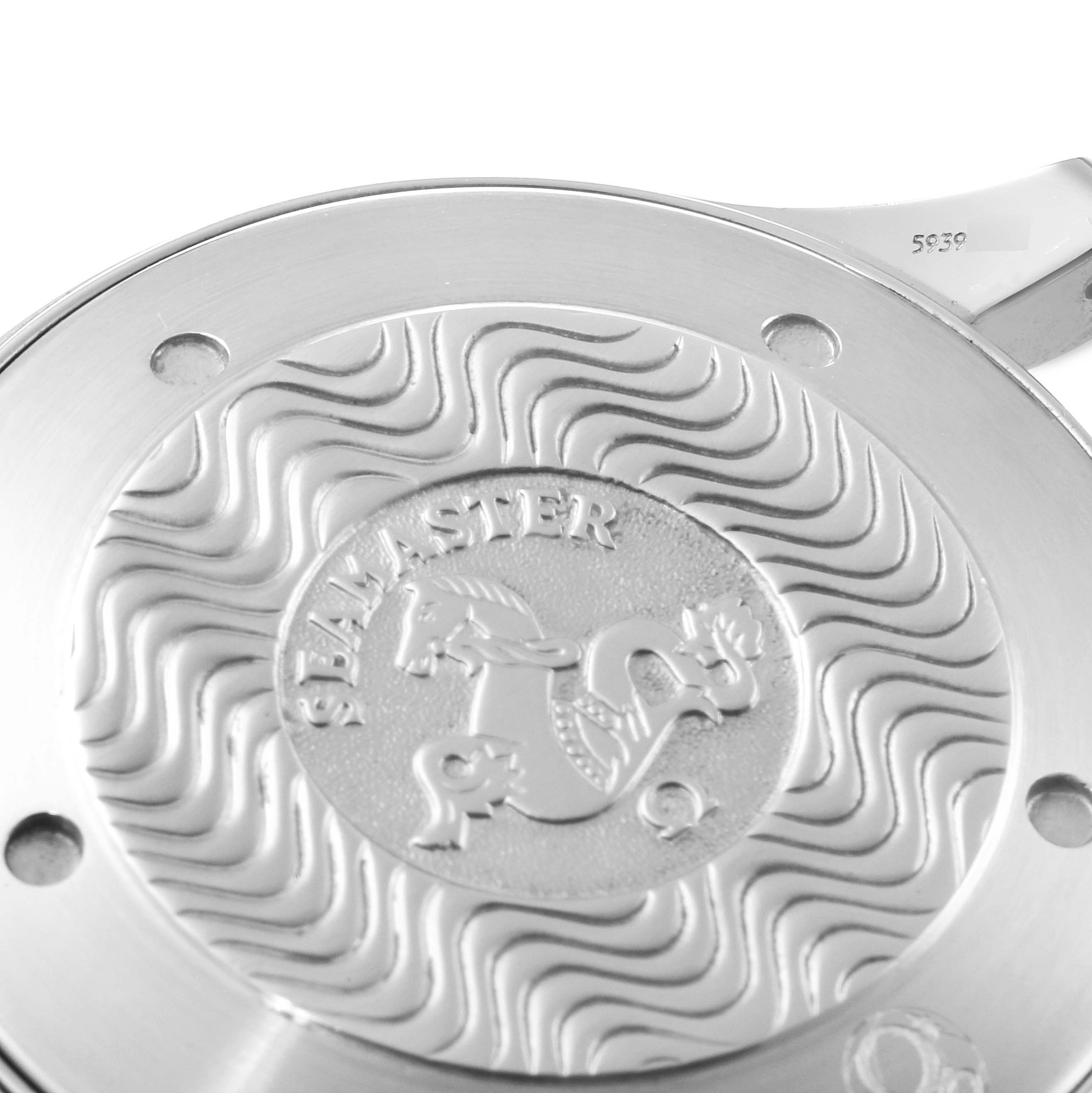 The image shows an angled view of the case back of an Omega Seamaster 2541.80.00 Men
s Stainless Steel Blue Dial 2541.80.00 Men
s Stainless Steel Blue Dial watch, highlighting its engravings and logo.