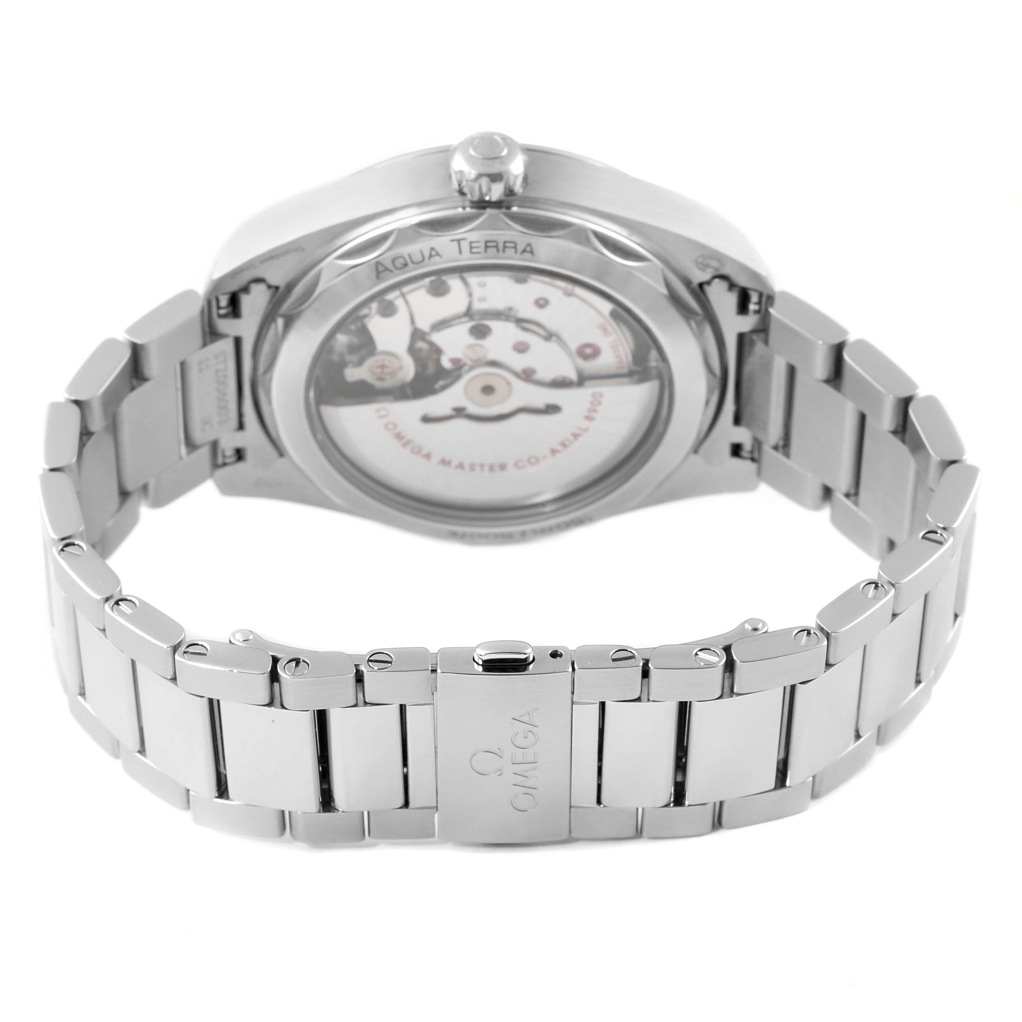 The image shows the back case and bracelet of the Omega Aqua Terra 220.10.41.21.03.002 Men
s Stainless Steel Blue Dial 220.10.41.21.03.002 Men
s Stainless Steel Blue Dial watch, highlighting its internal mechanism and stainless steel clasp.