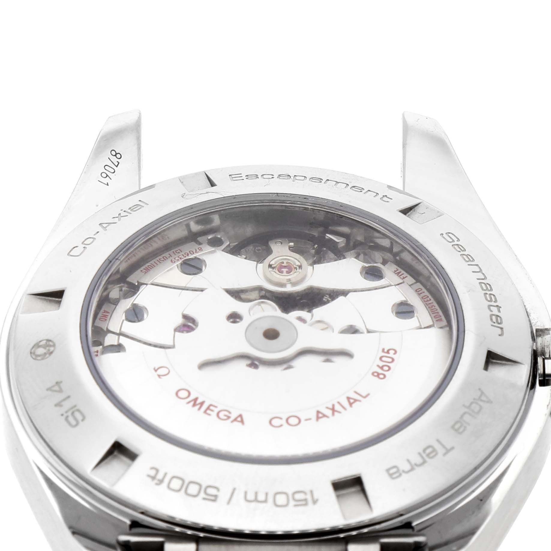 The image shows the case back of the Omega Aqua Terra 231.10.43.22.03.001 Men
s Stainless Steel Blue Dial 231.10.43.22.03.001 Men
s Stainless Steel Blue Dial watch, highlighting its Co-Axial escapement and internal mechanism.