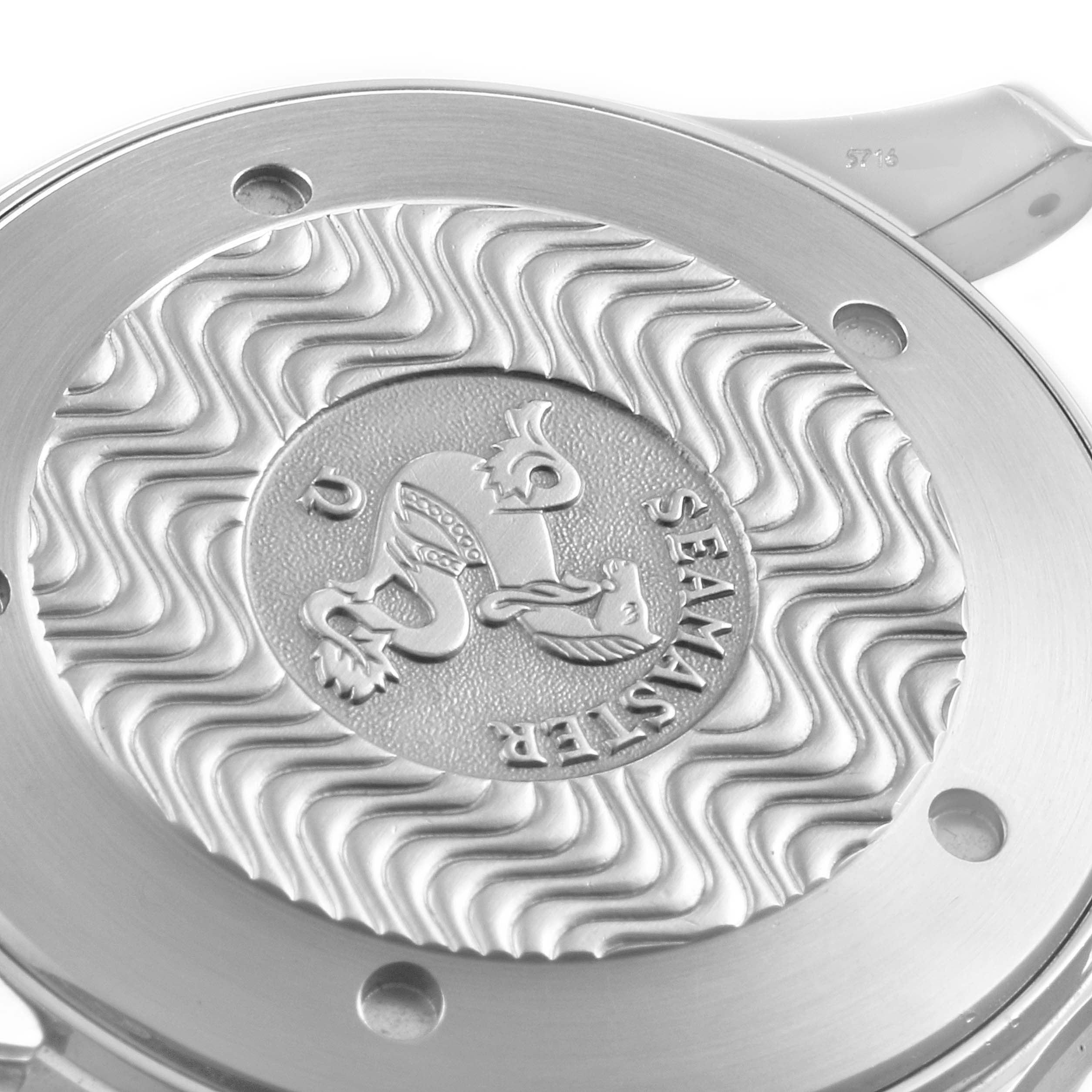 The image shows the engraved case back of an Omega Seamaster 2265.80.00 Men
s Stainless Steel Blue Dial 2265.80.00 Men
s Stainless Steel Blue Dial watch from a top-down angle.