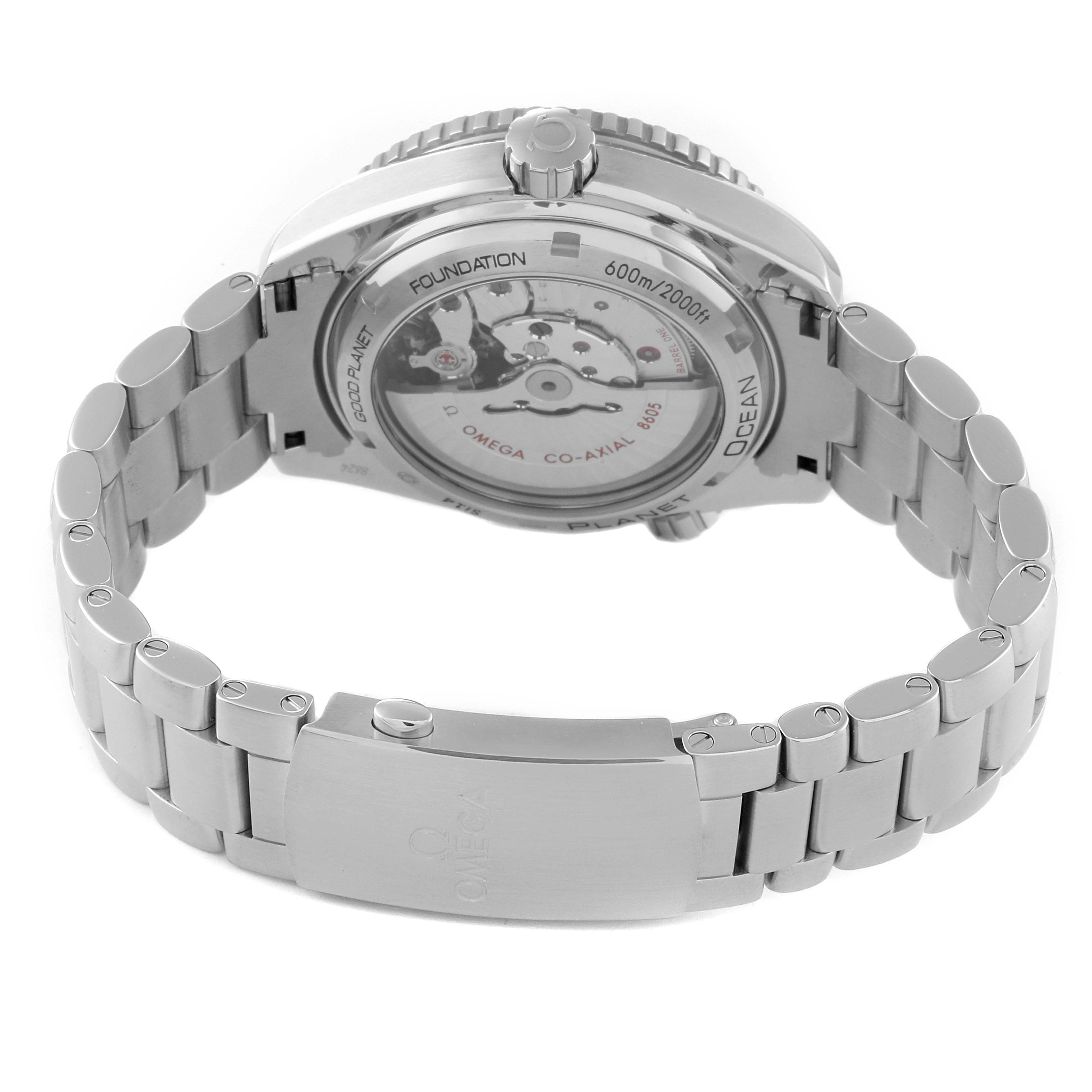 The image shows the back view of the Omega Planet Ocean 232.30.44.22.03.001 Men
s Stainless Steel Blue Dial 232.30.44.22.03.001 Men
s Stainless Steel Blue Dial watch, highlighting the transparent case back and metal bracelet.