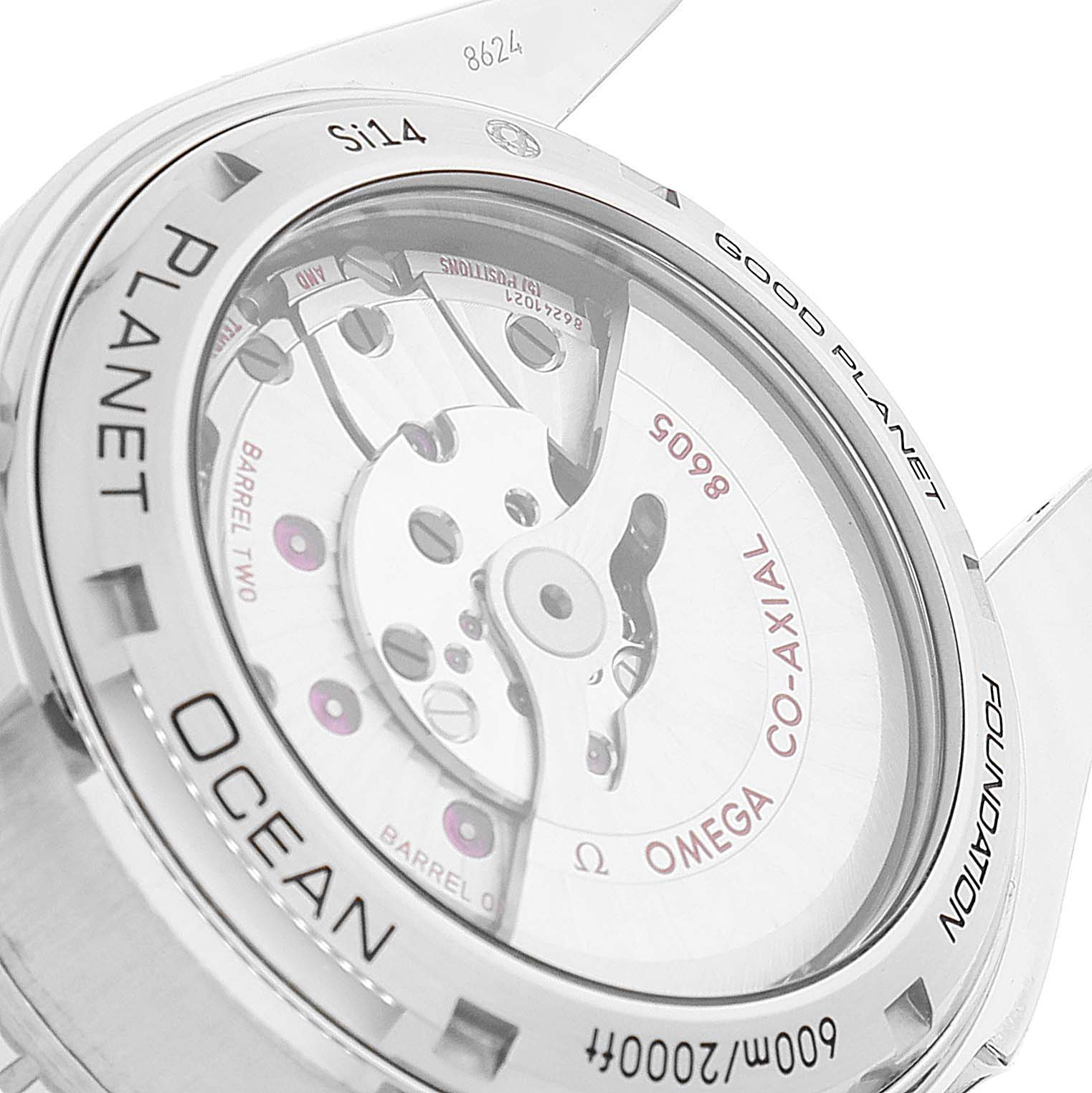 The image shows the back of the Omega Planet Ocean 232.30.44.22.03.001 Men
s Stainless Steel Blue Dial 232.30.44.22.03.001 Men
s Stainless Steel Blue Dial watch, highlighting its transparent case back and internal mechanism.