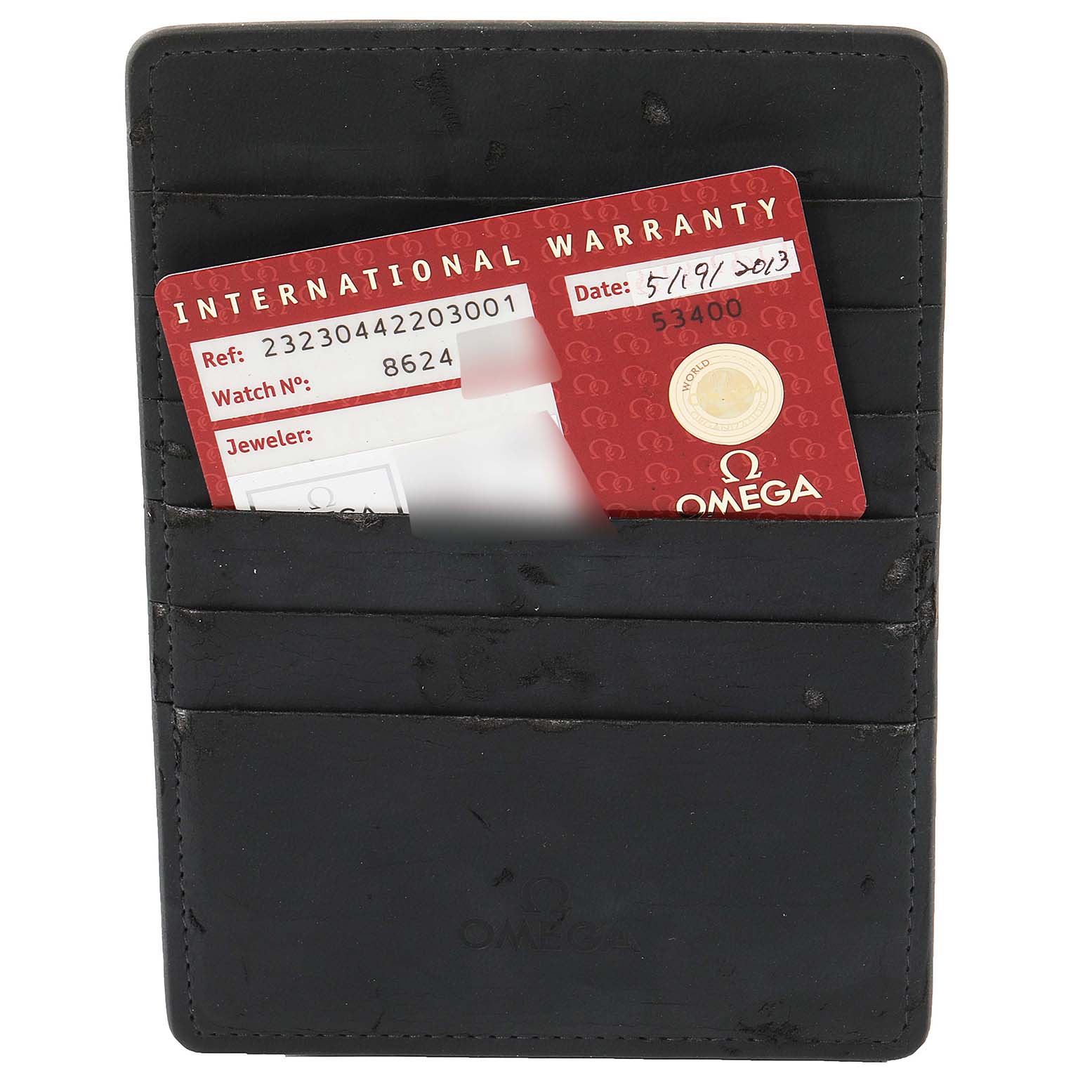 This image shows a leather cardholder with an Omega Planet Ocean 232.30.44.22.03.001 Men
s Stainless Steel Blue Dial 232.30.44.22.03.001 Men
s Stainless Steel Blue Dial International Warranty card inside.