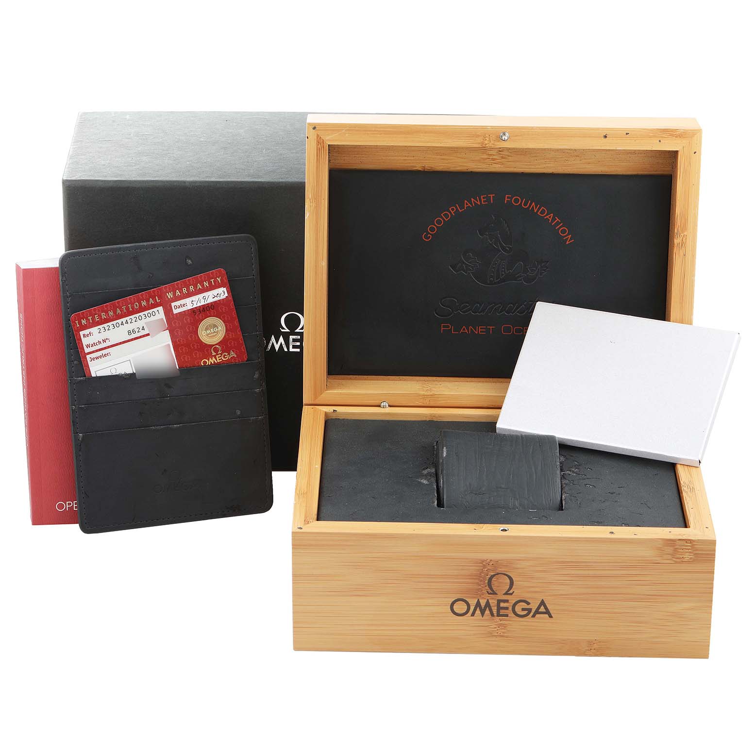 The image shows the packaging, warranty card, and documentation for the Omega Planet Ocean 232.30.44.22.03.001 Men
s Stainless Steel Blue Dial 232.30.44.22.03.001 Men
s Stainless Steel Blue Dial watch.