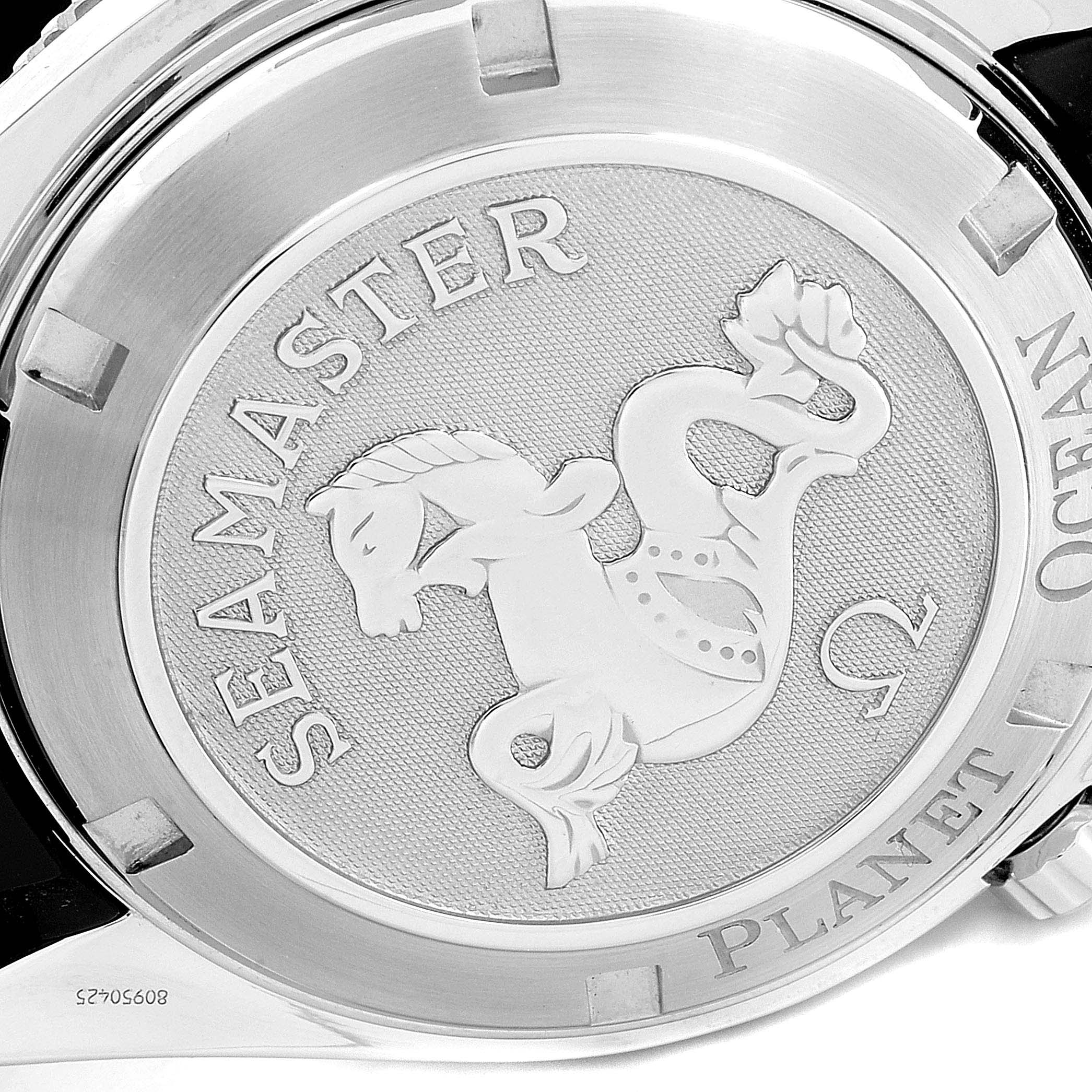 This image showcases the case back of an Omega Seamaster 2909.50.91 Men
s Stainless Steel Black Dial 2909.50.91 Men
s Stainless Steel Black Dial Planet Ocean watch, featuring its distinctive embossed design and logo.