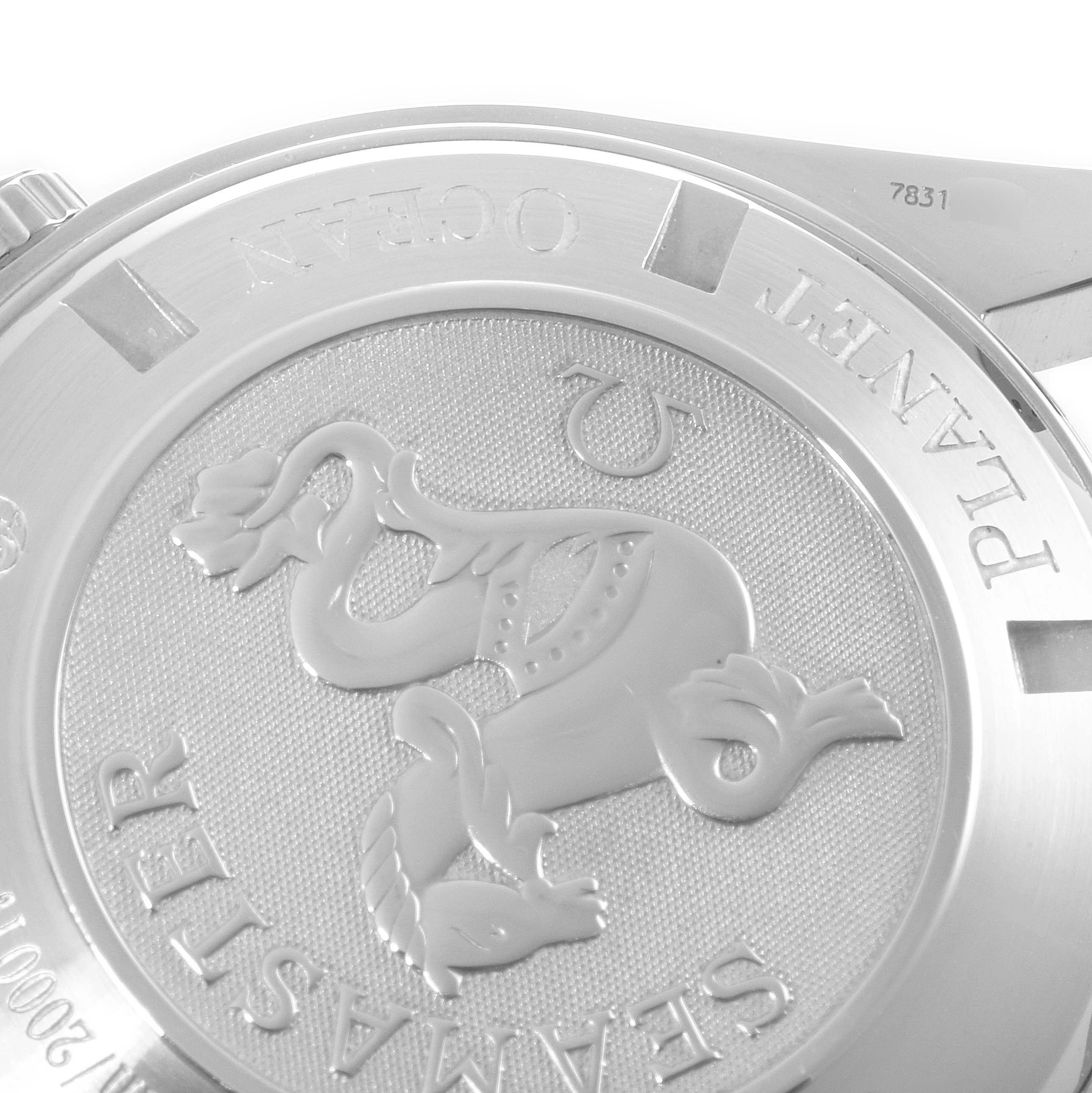 The image shows the back case of an Omega Planet Ocean 2218.50.00 Men
s Stainless Steel Black Dial 2218.50.00 Men
s Stainless Steel Black Dial watch, displaying the Seamaster logo and inscriptions.