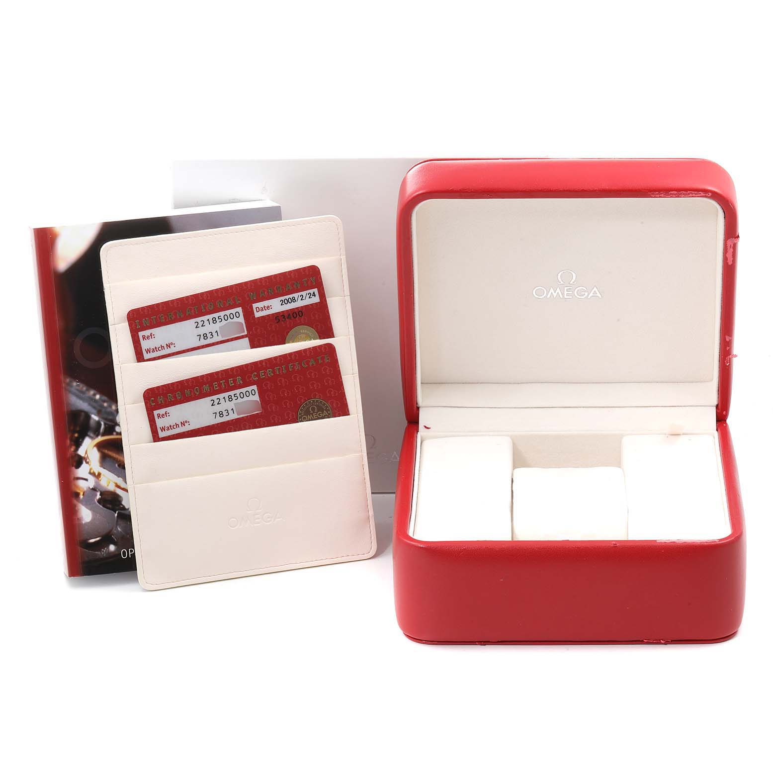 This image shows the accessories for an Omega Planet Ocean 2218.50.00 Men
s Stainless Steel Black Dial 2218.50.00 Men
s Stainless Steel Black Dial watch, including the box, manuals, and certification cards.