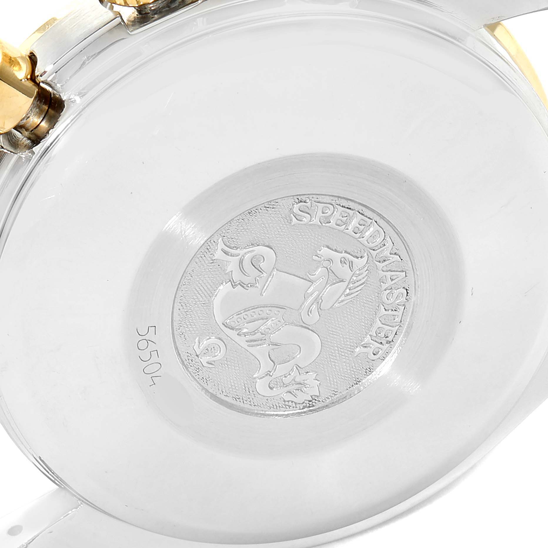 The image shows the back case of an Omega Speedmaster 3313.50.00 Men's Steel and Gold (two tone) Black Dial 3313.50.00 Men's Steel and Gold (two tone) Black Dial watch with its engravings and part of the strap attachment.