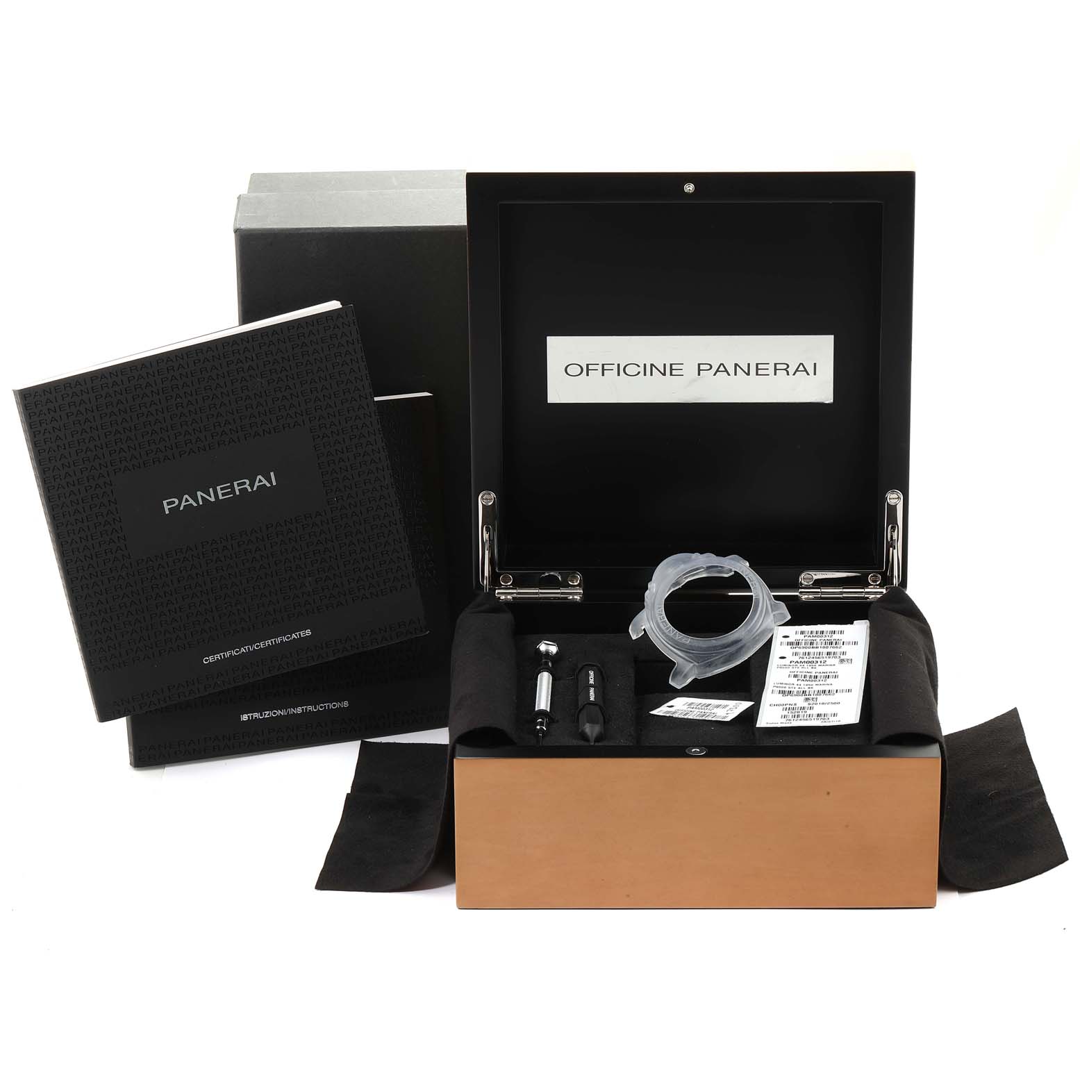 The image shows the packaging and accessories for the Panerai Luminor PAM00312 Men
s Stainless Steel Black Dial PAM00312 Men
s Stainless Steel Black Dial, including a box, manuals, watch tools, and protective parts.