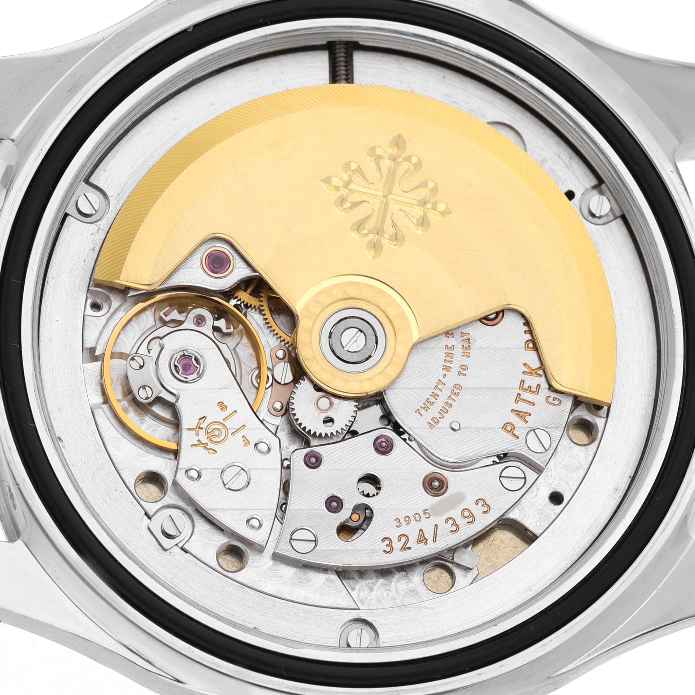 This image shows the back view of a Patek Philippe Aquanaut 5165A-001 Men's Stainless Steel Black Dial, highlighting its mechanical movement and rotor.