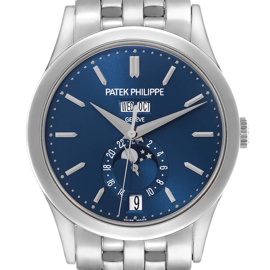 The Patek Philippe Complications model is shown from a front angle, displaying the blue dial, date, and moon phase features.