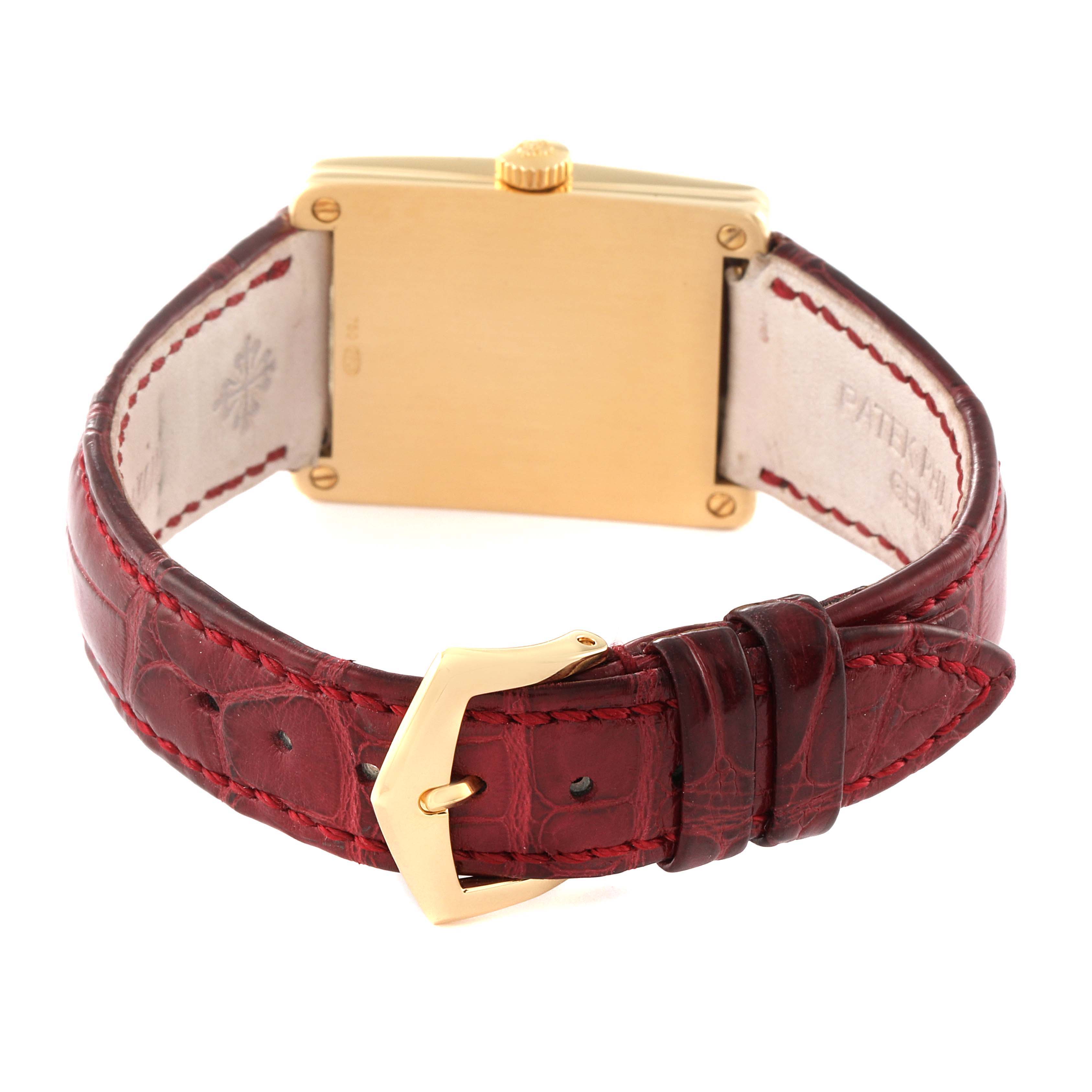 The image shows the back view of a Patek Philippe Gondolo 5010J Men's Yellow Gold Silver Dial 5010J Men's Yellow Gold Silver Dial watch, highlighting its strap and buckle.