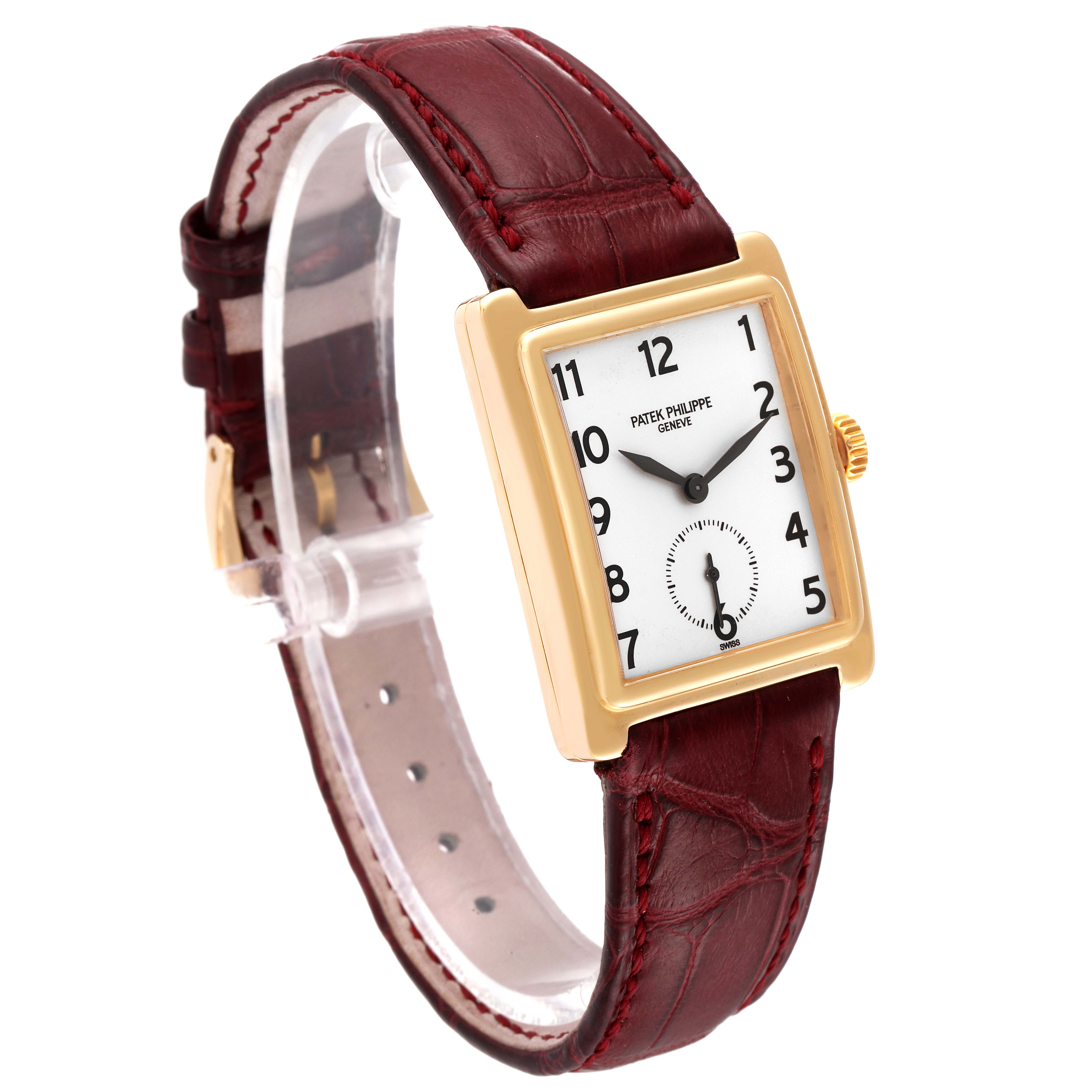 This image shows a Patek Philippe Gondolo 5010J Men's Yellow Gold Silver Dial 5010J Men's Yellow Gold Silver Dial watch at a three-quarter angle, highlighting its rectangular face, white dial, and red leather strap.