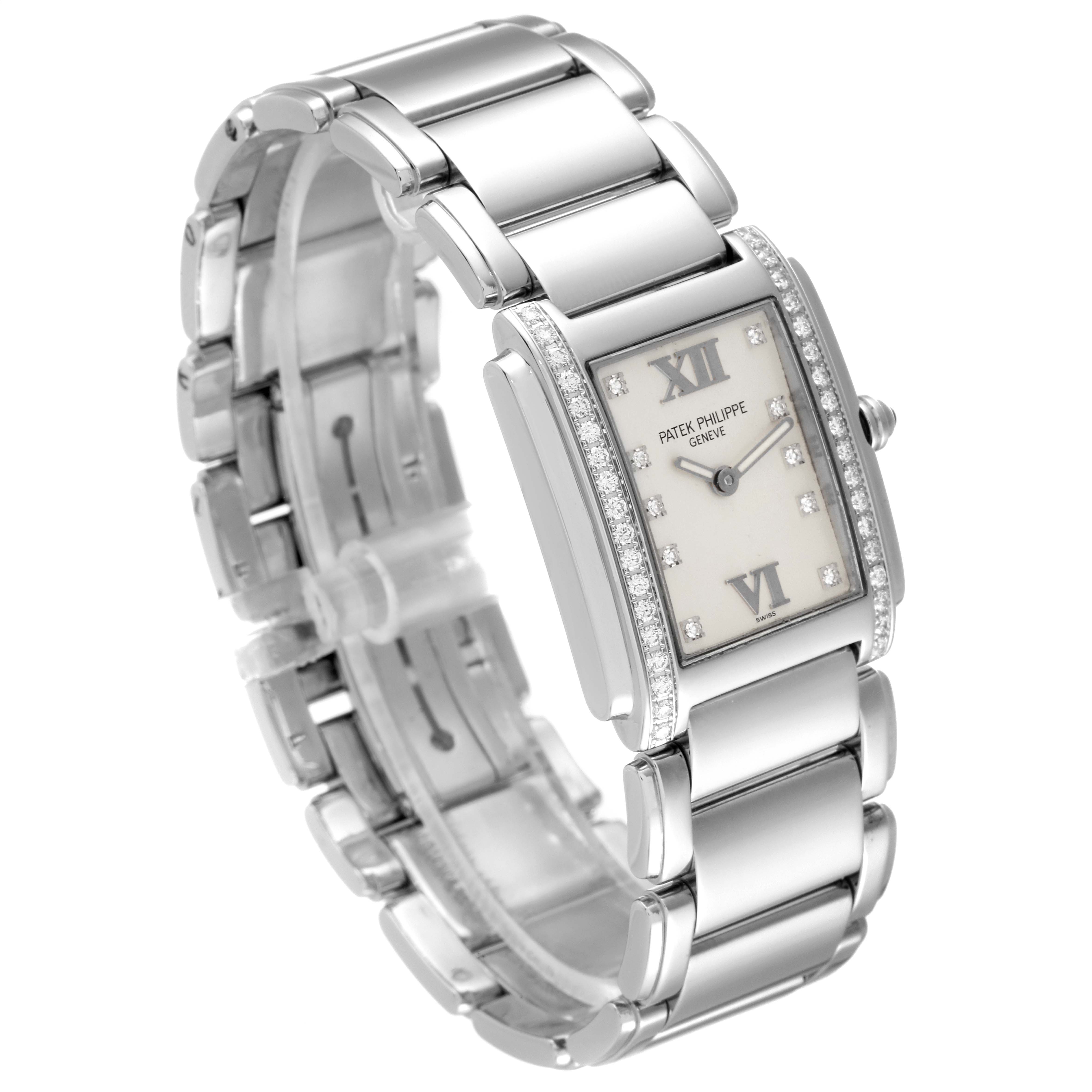 The Patek Philippe Twenty-4 4910/10A-010 Women's Stainless Steel Silver Dial 4910/10A-010 Women's Stainless Steel Silver Dial model watch is shown at a slight side angle, highlighting its rectangular face and stainless steel bracelet.